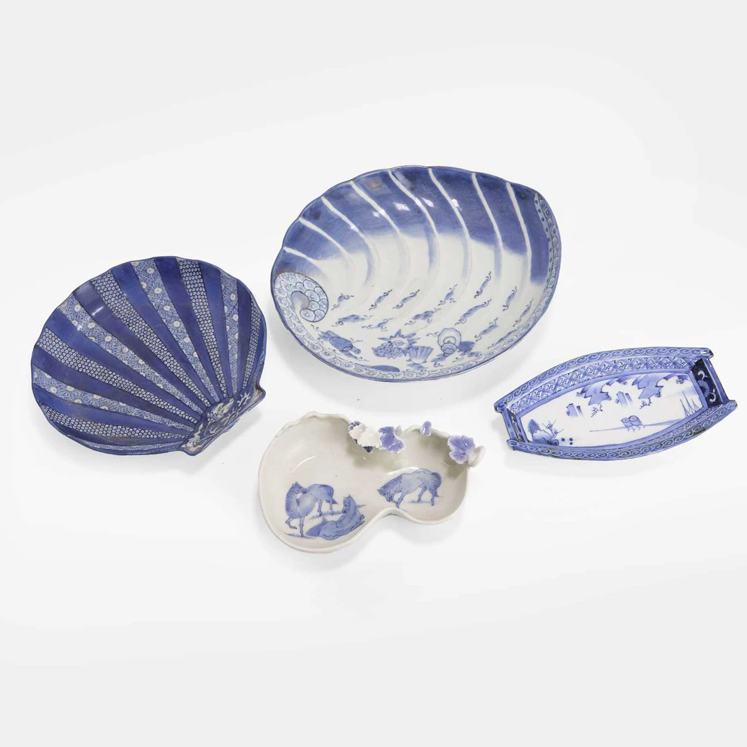 A collection of four Japanese blue and white plates 19th-20th century