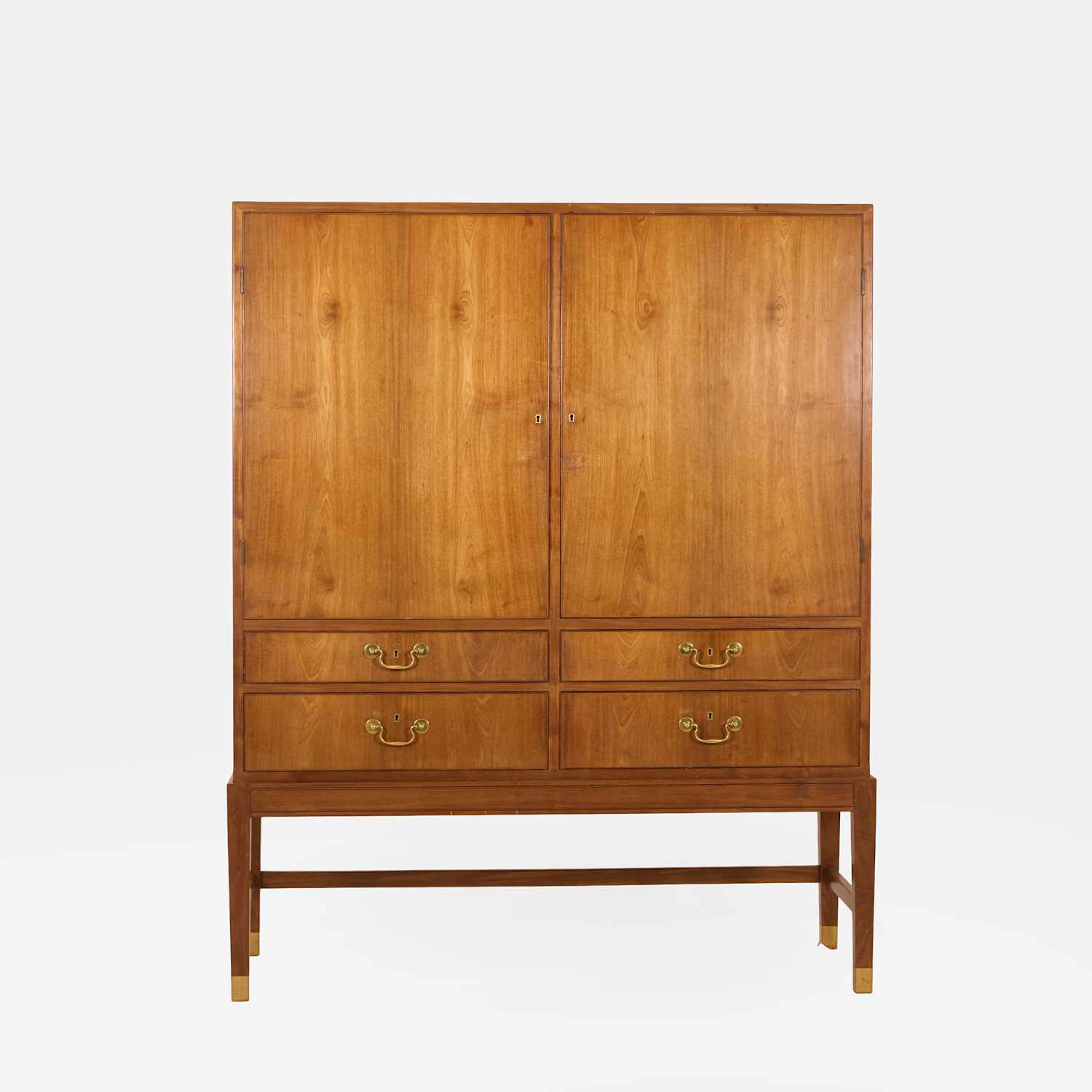 Jacob Kjaer (Danish, 1896-1957) for Nordex a mahogany cabinet