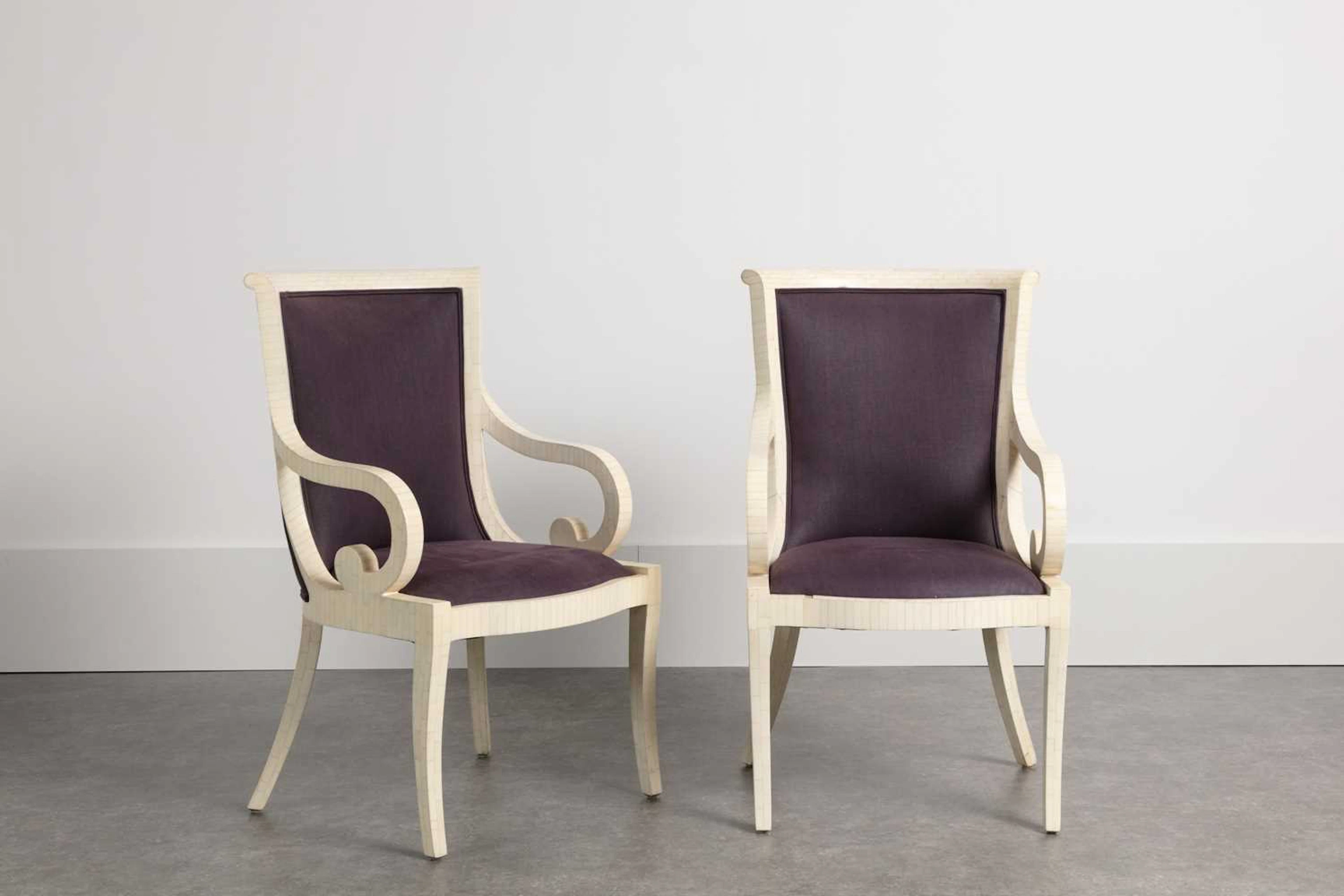 A pair of tessellated bone dining armchairs