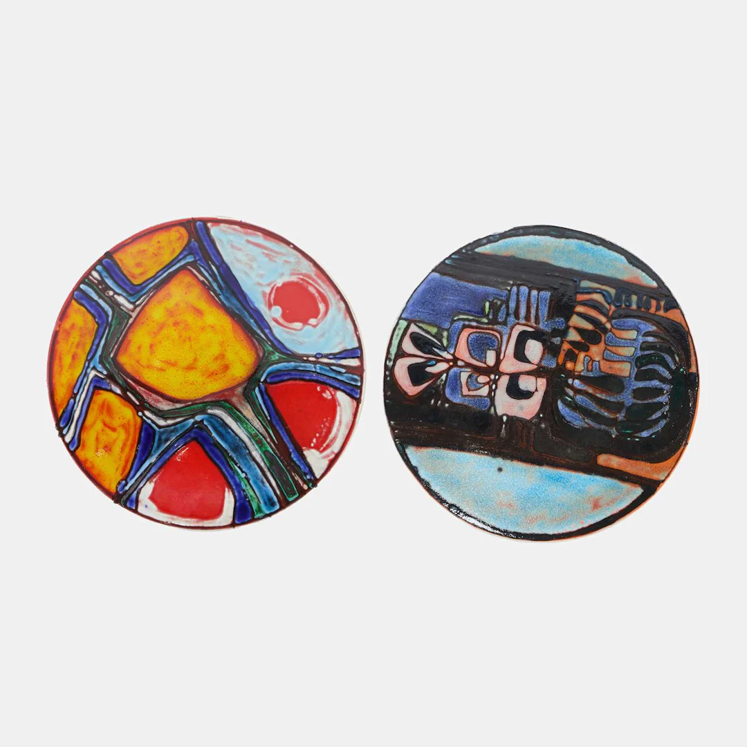 Poole Pottery two 'Delphis' chargers
