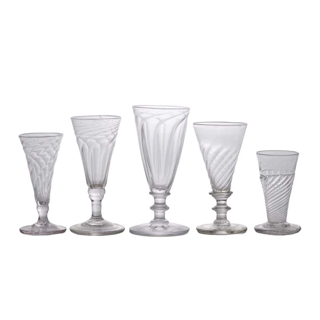 A large collection of wrythen-moulded ale glasses late 18th century and later