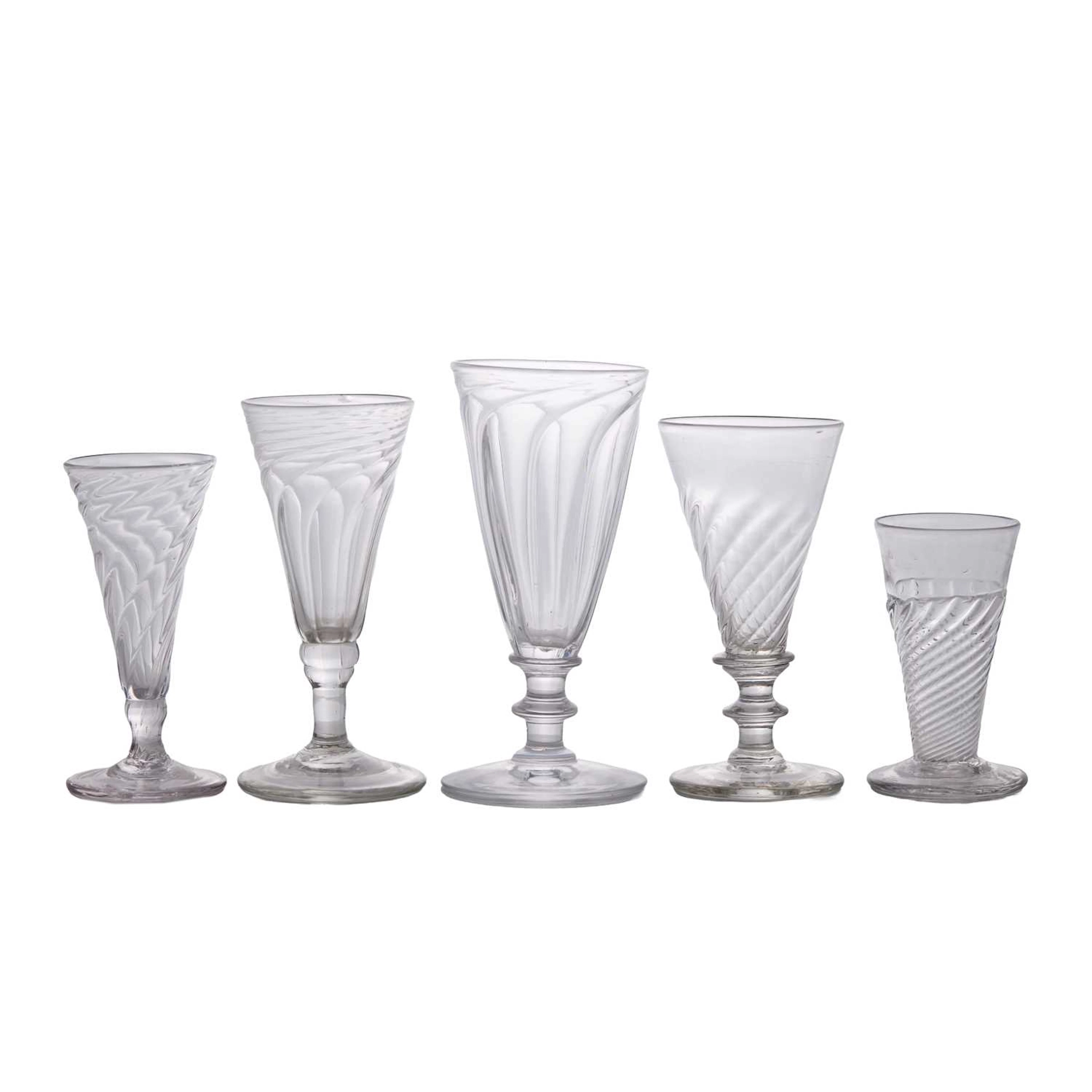 A large collection of wrythen-moulded ale glasses late 18th century and later