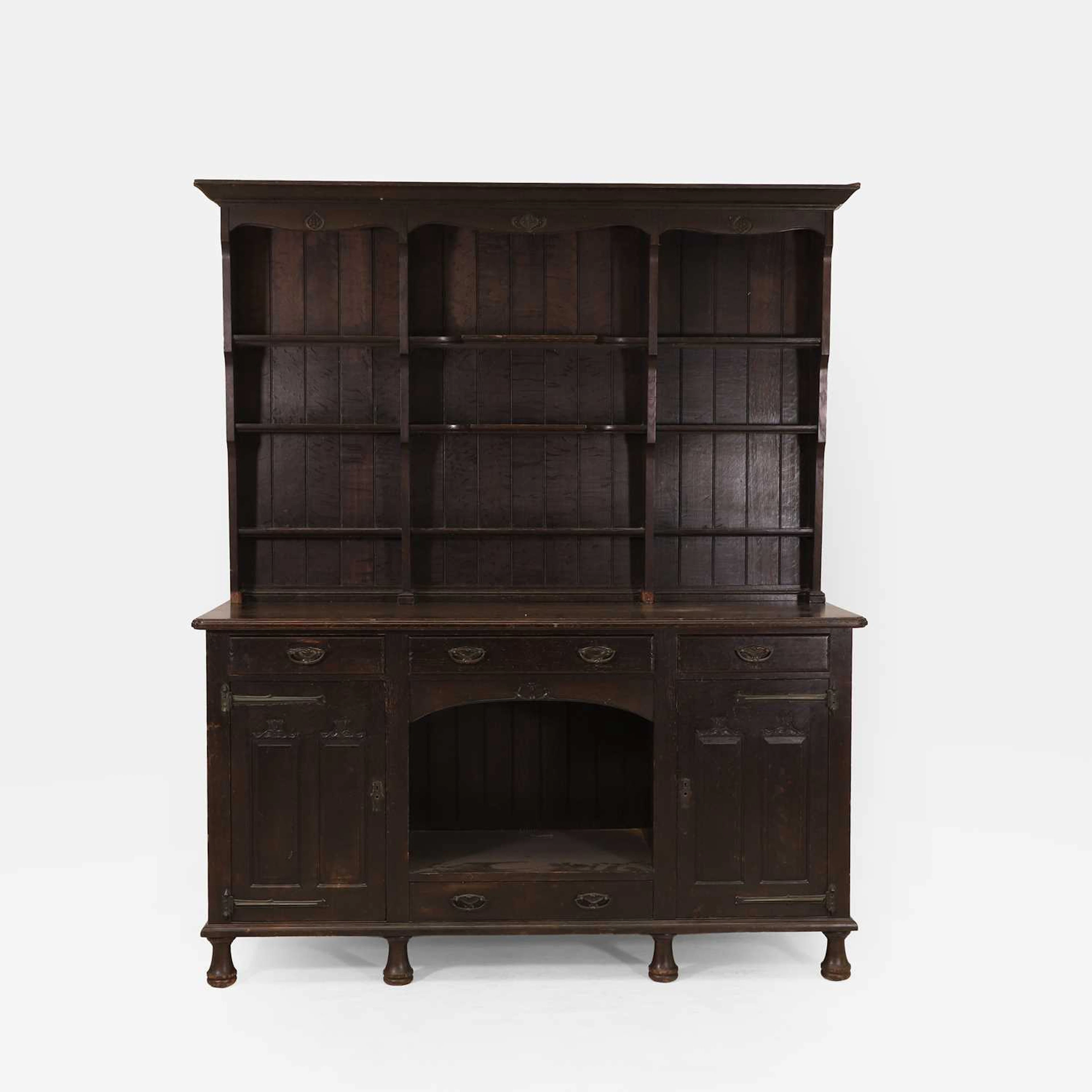 WAS Benson (British, 1854-1924) for Morris & Co. a large oak dresser