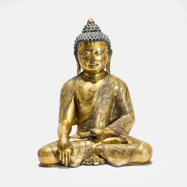 A Chinese gilt-bronze Shakyamuni Buddha probably Ming dynasty
