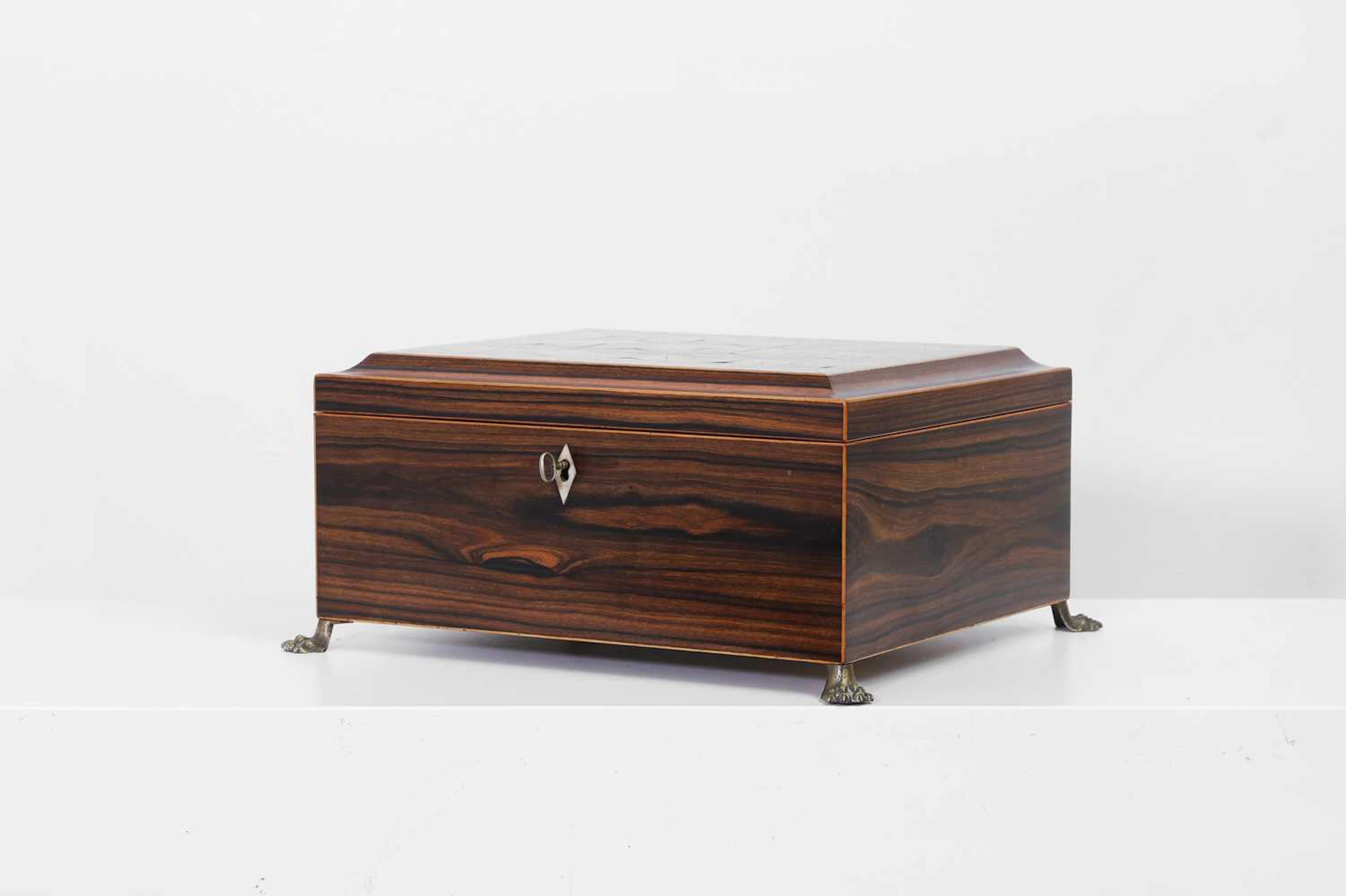 A Regency calamander and parquetry casket