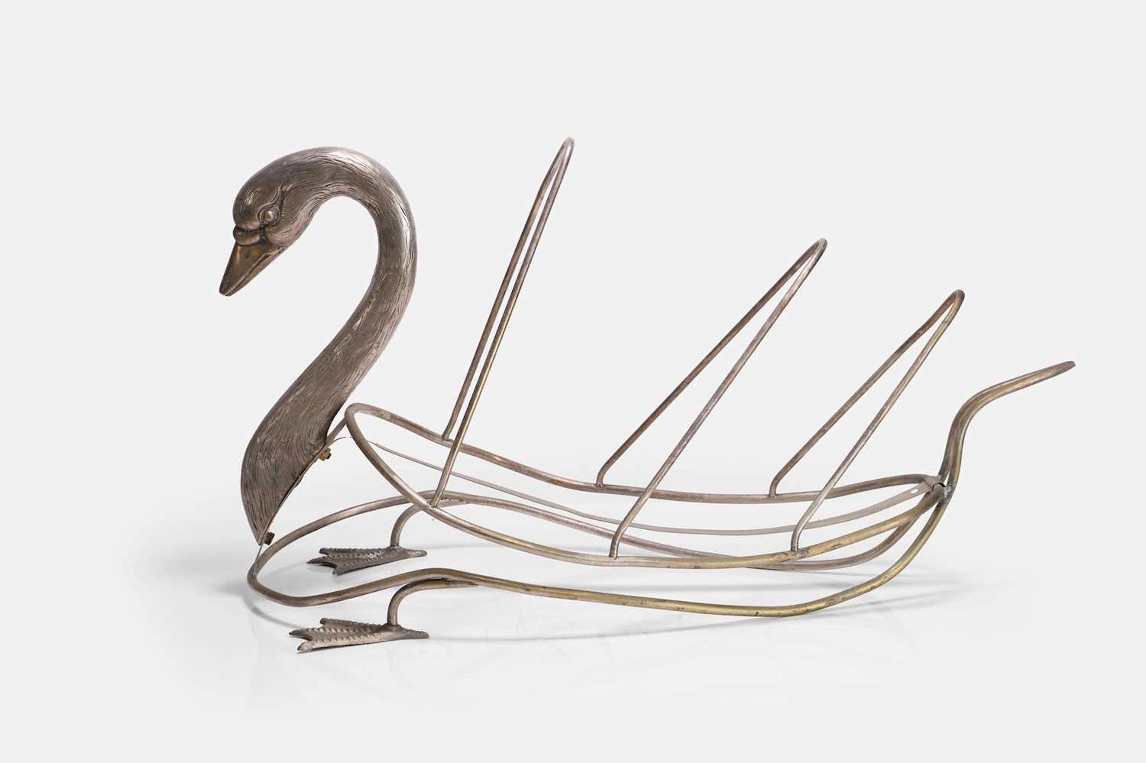 A silver-plated magazine rack in the manner of Maison Jansen mid-20th century
