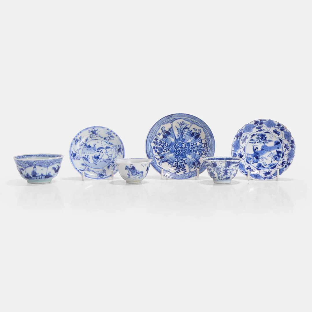 Three matching Chinese blue and white cups and saucers Kangxi (1662-1722)