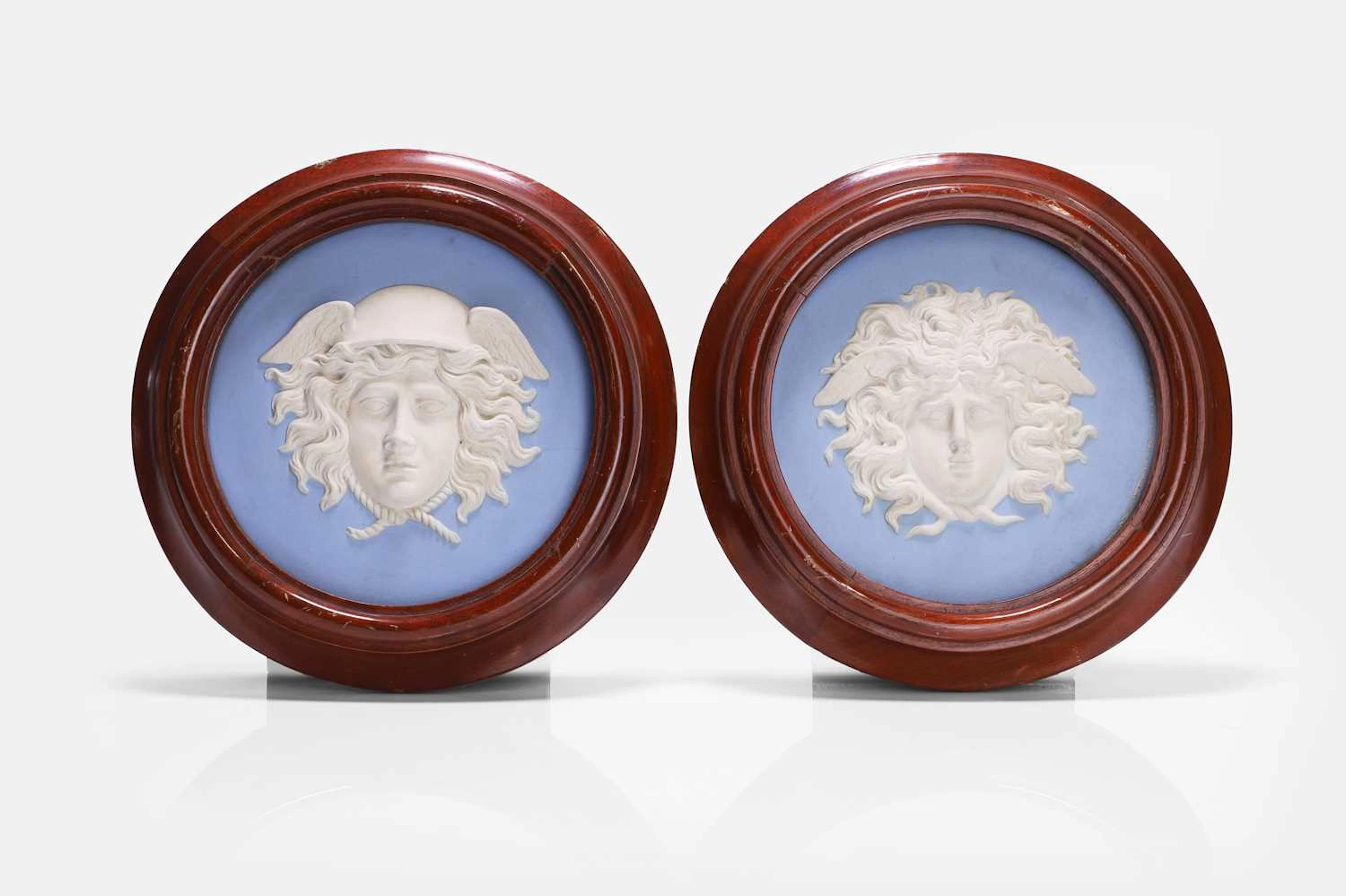 A pair of Wedgwood blue jasperware plaques c.1891-1908