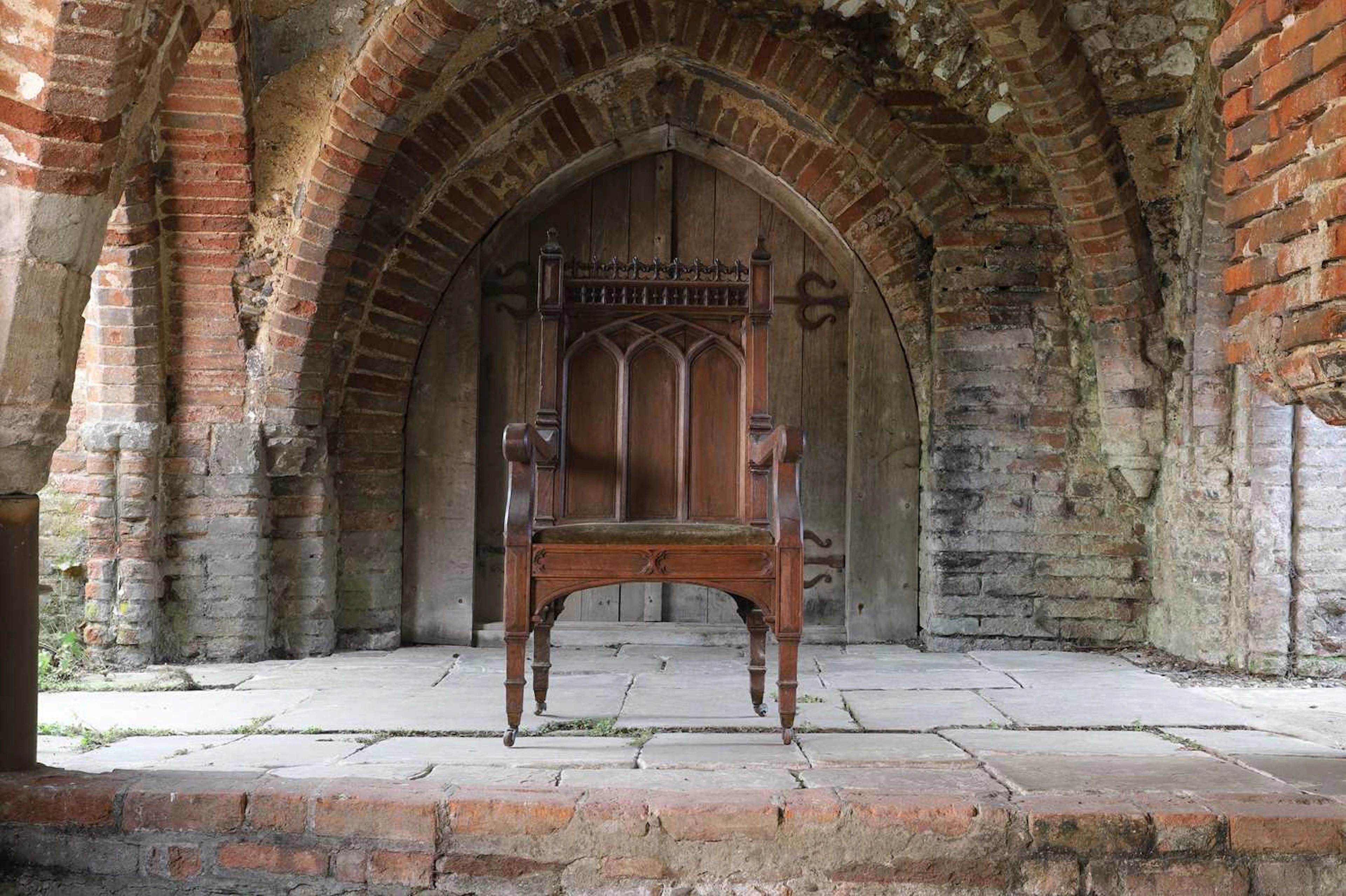 A Victorian Gothic Revival oak armchair late 19th century