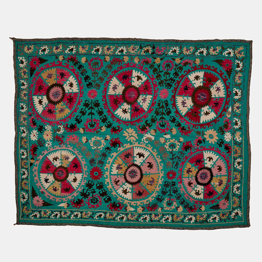 A silk embroidered suzani panel early 20th century, Uzbekistan