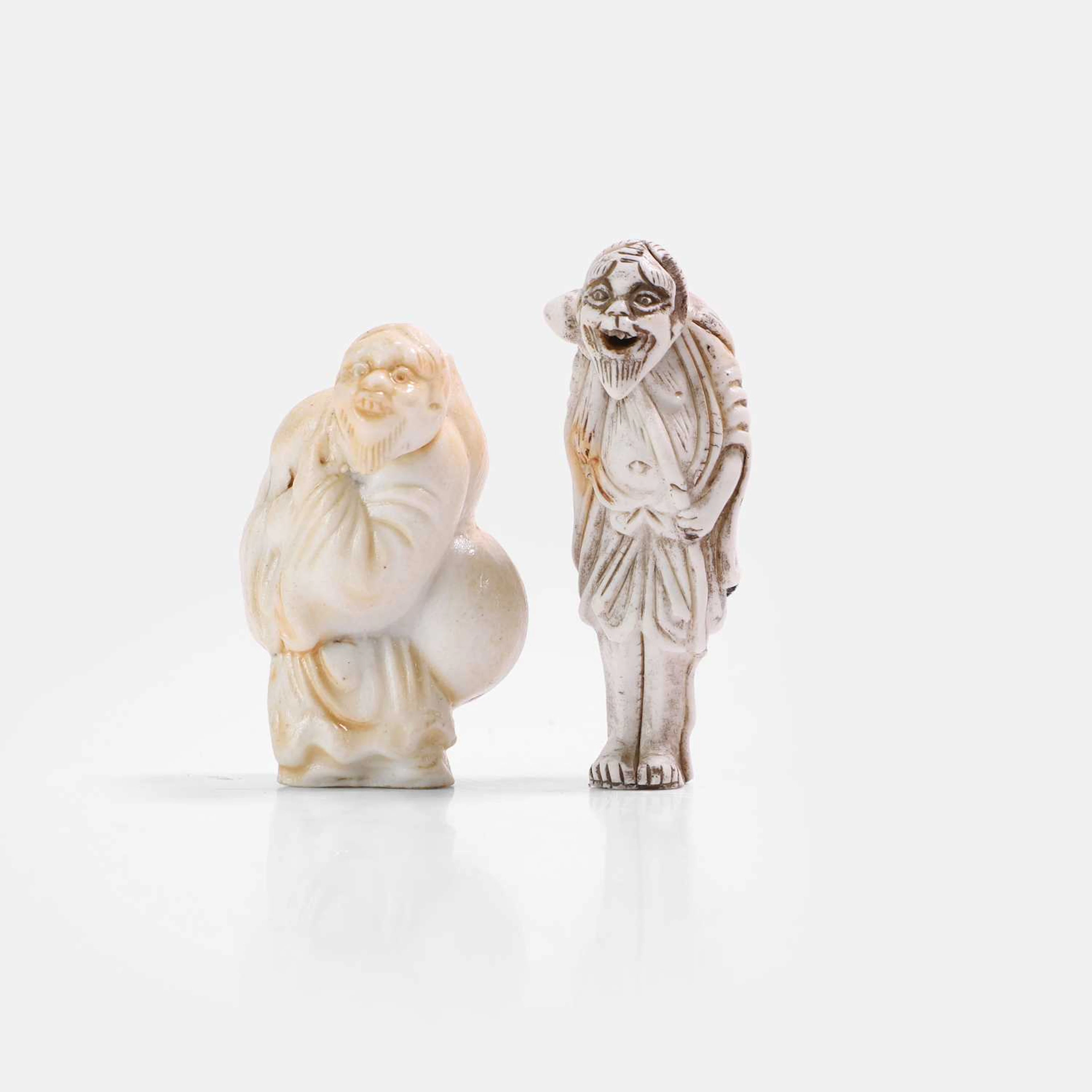 Two Japanese porcelain netsuke Meiji period (1868-1912)