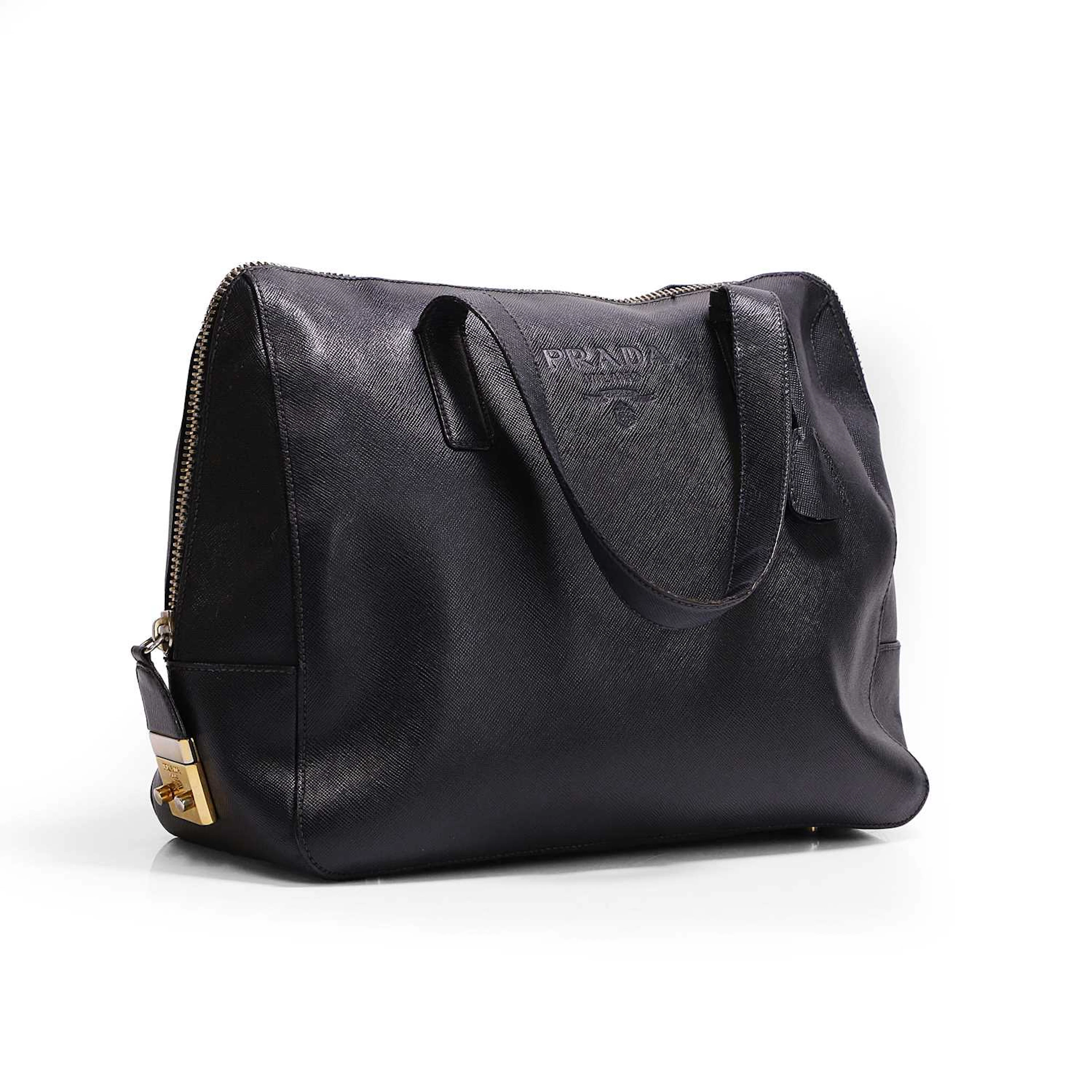 A Prada navy blue leather handbag