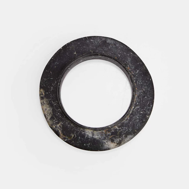 A Chinese collared jade disc Shang dynasty (circa 1600-1100 BCE)