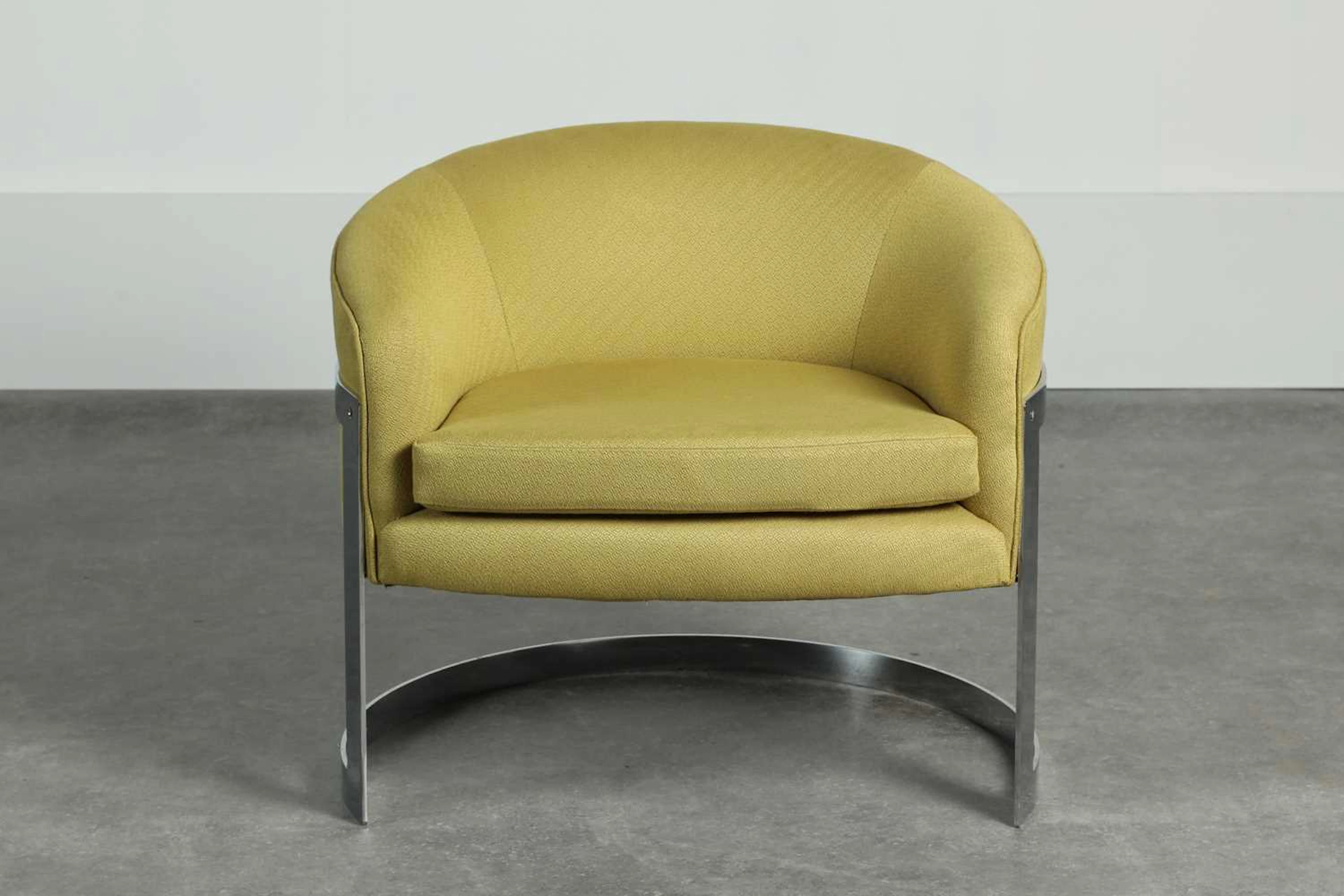 A steel and upholstered armchair