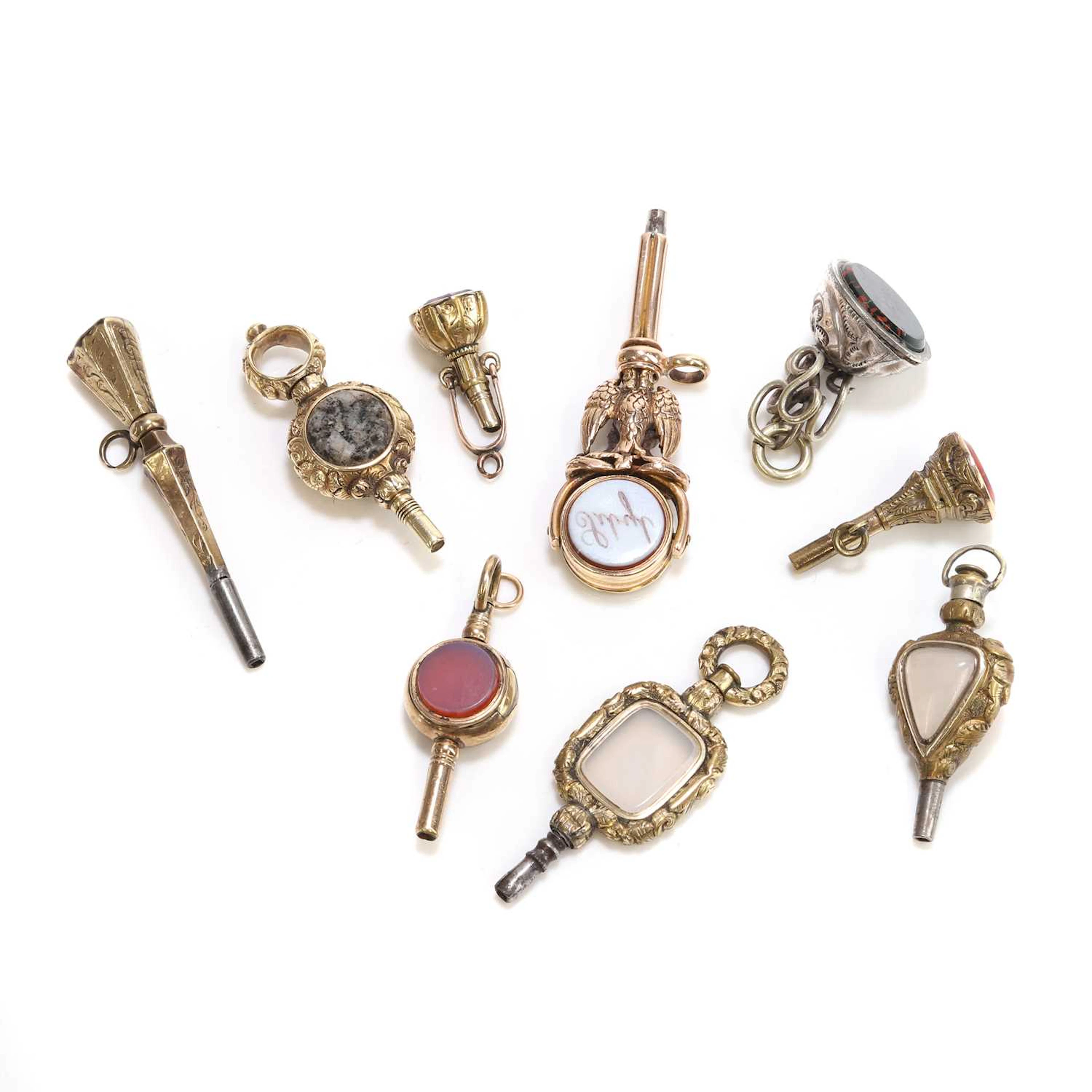A group of nine rolled gold and gold mounted watch keys regency and
