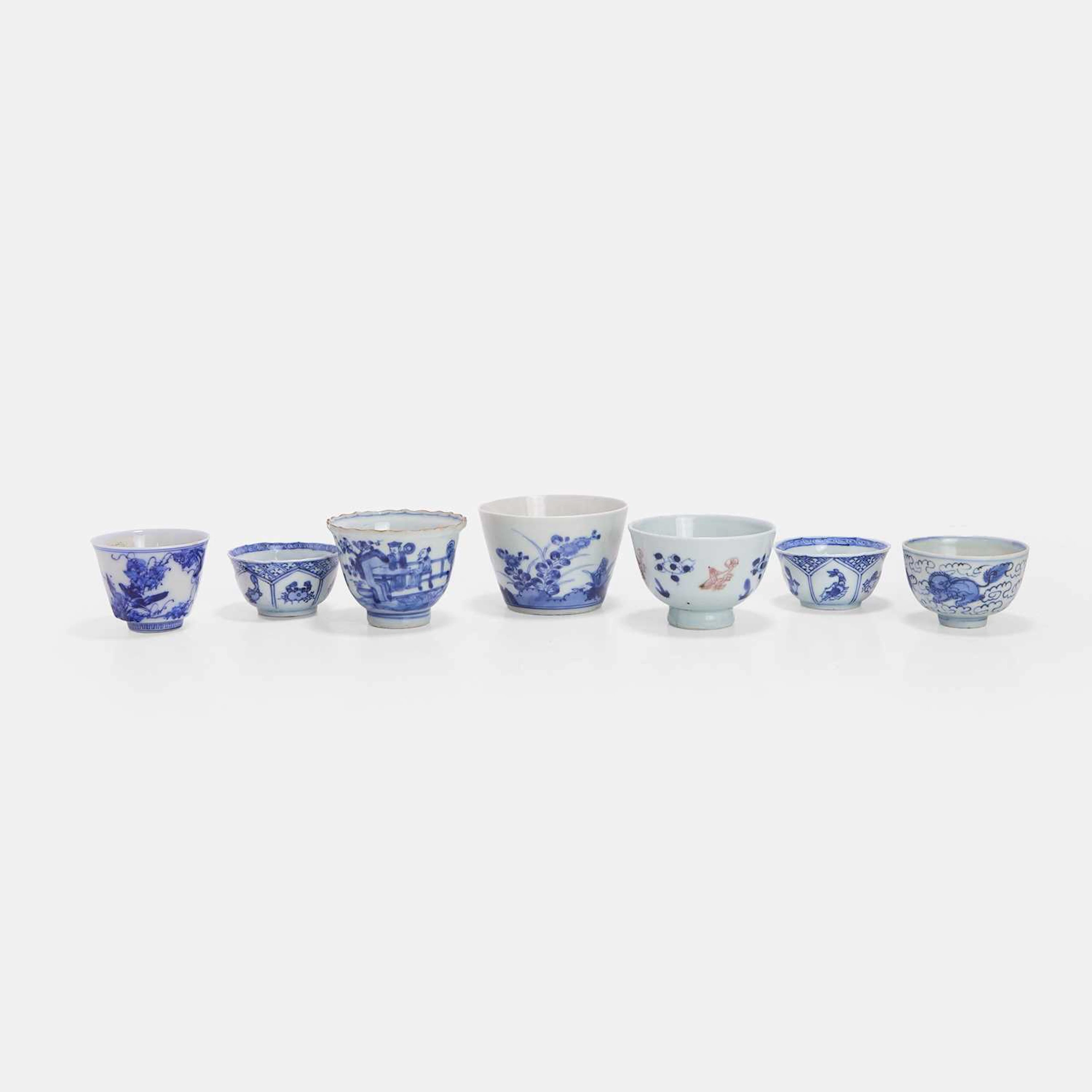 A collection of seven Japanese blue and white cups 18th-20th century
