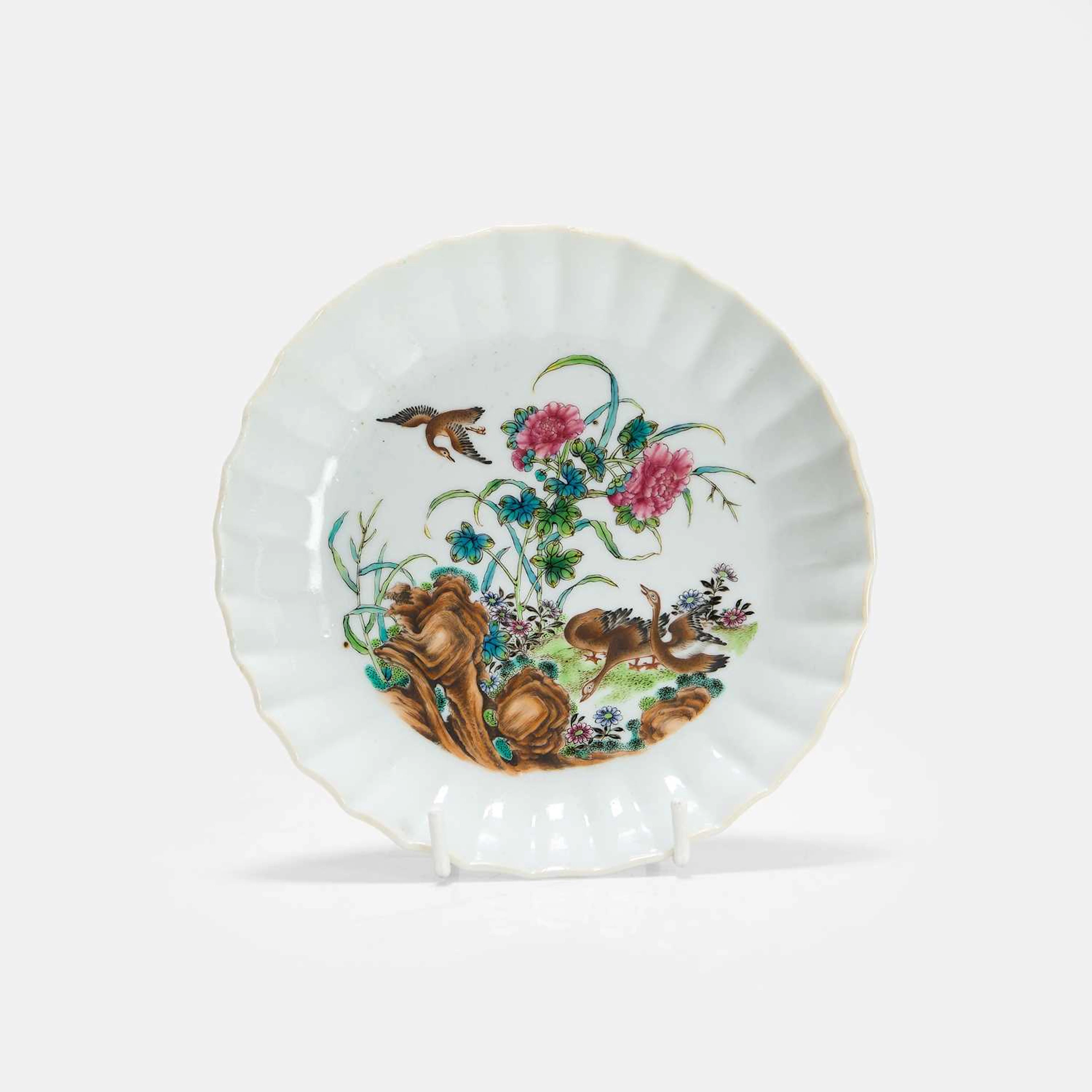 A Chinese famille rose saucer