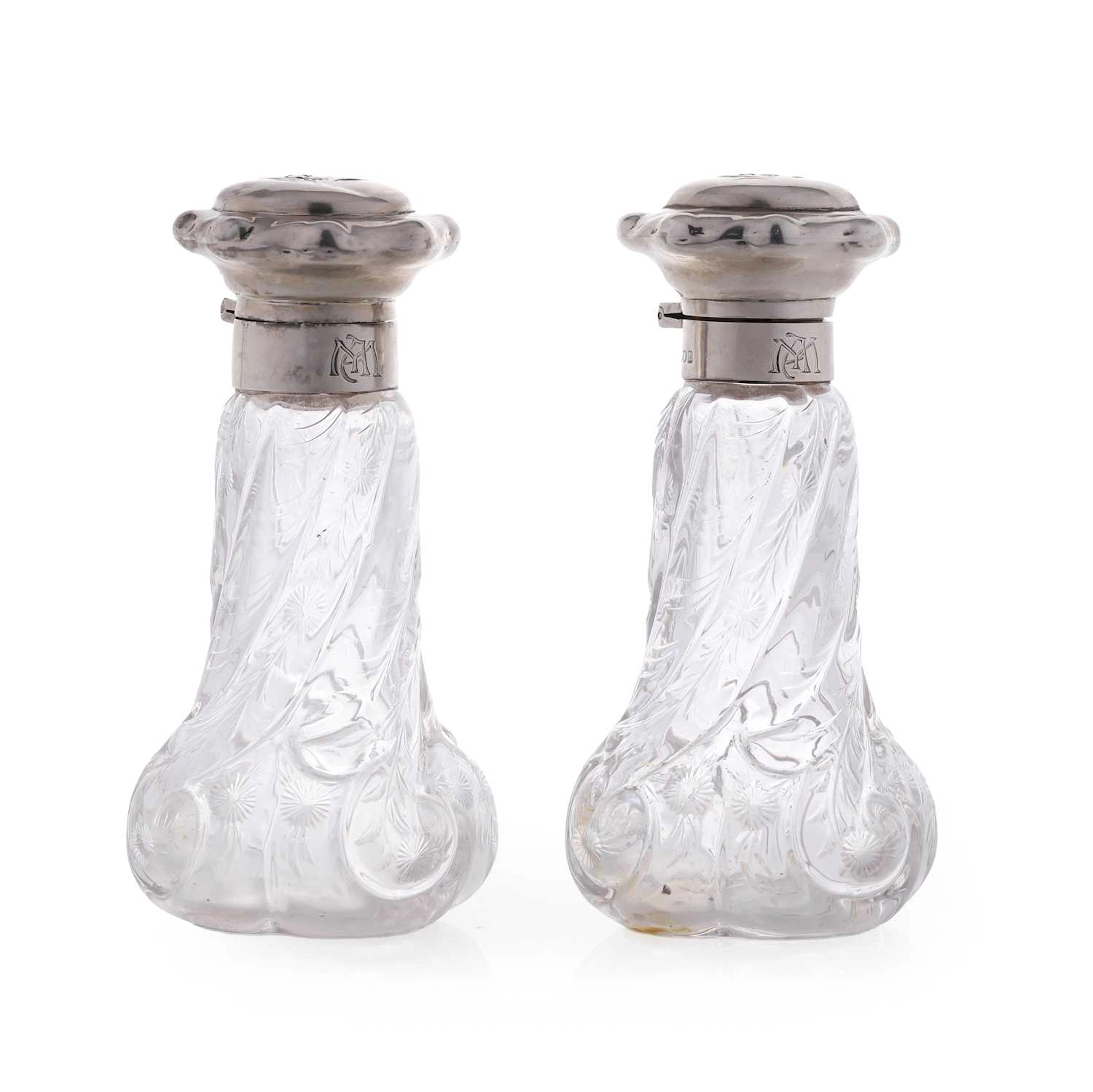 A pair of silver-mounted Stevens & Williams intaglio cut-glass scent