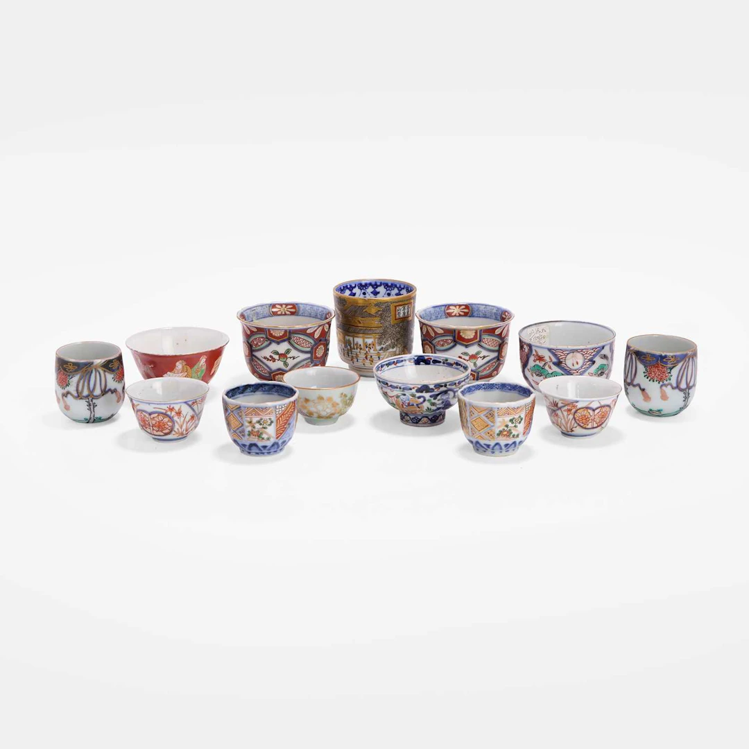 A collection of thirteen Japanese porcelain cups 18th-20th century