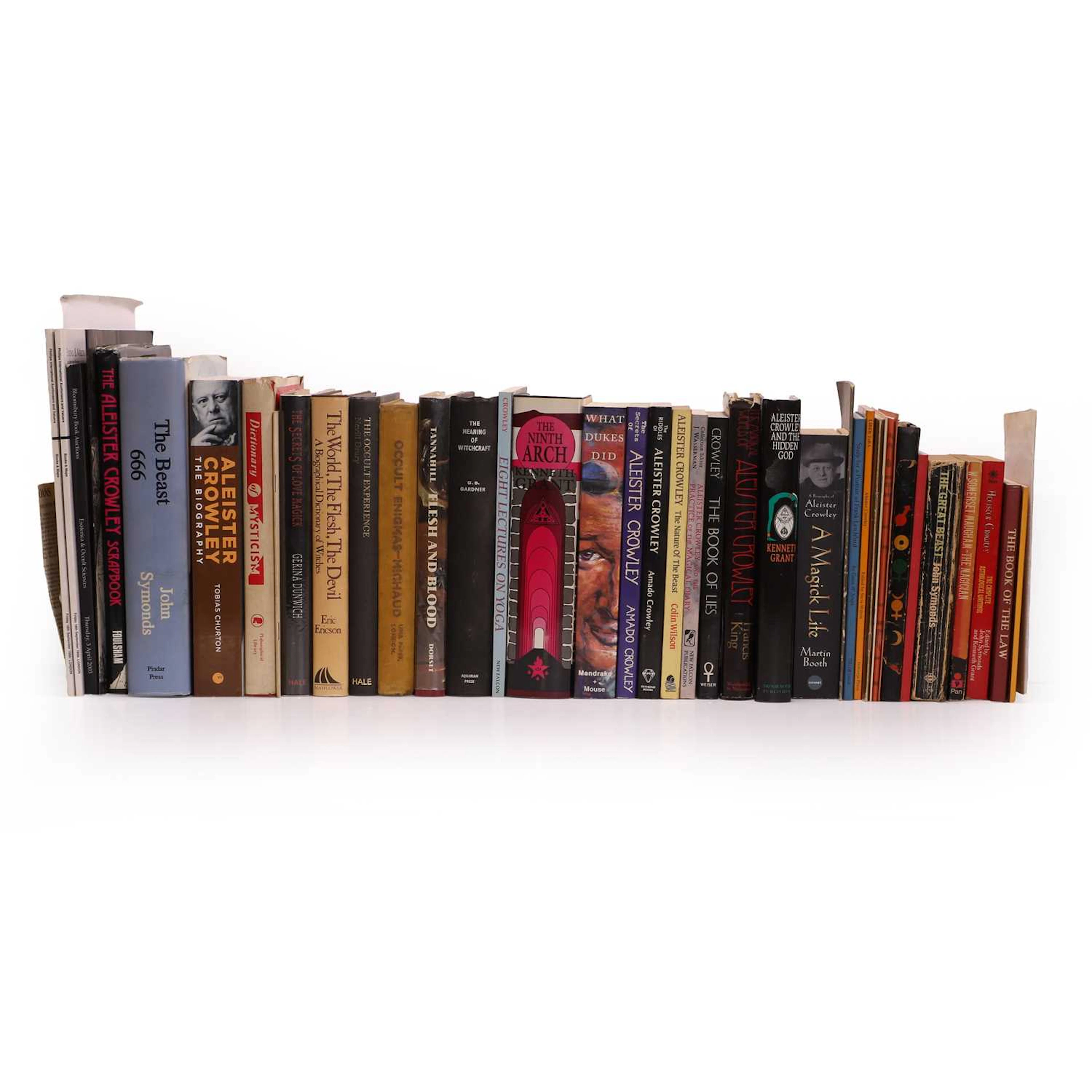 A large group of books relating to Aleister Crowley, witchcraft and the occult