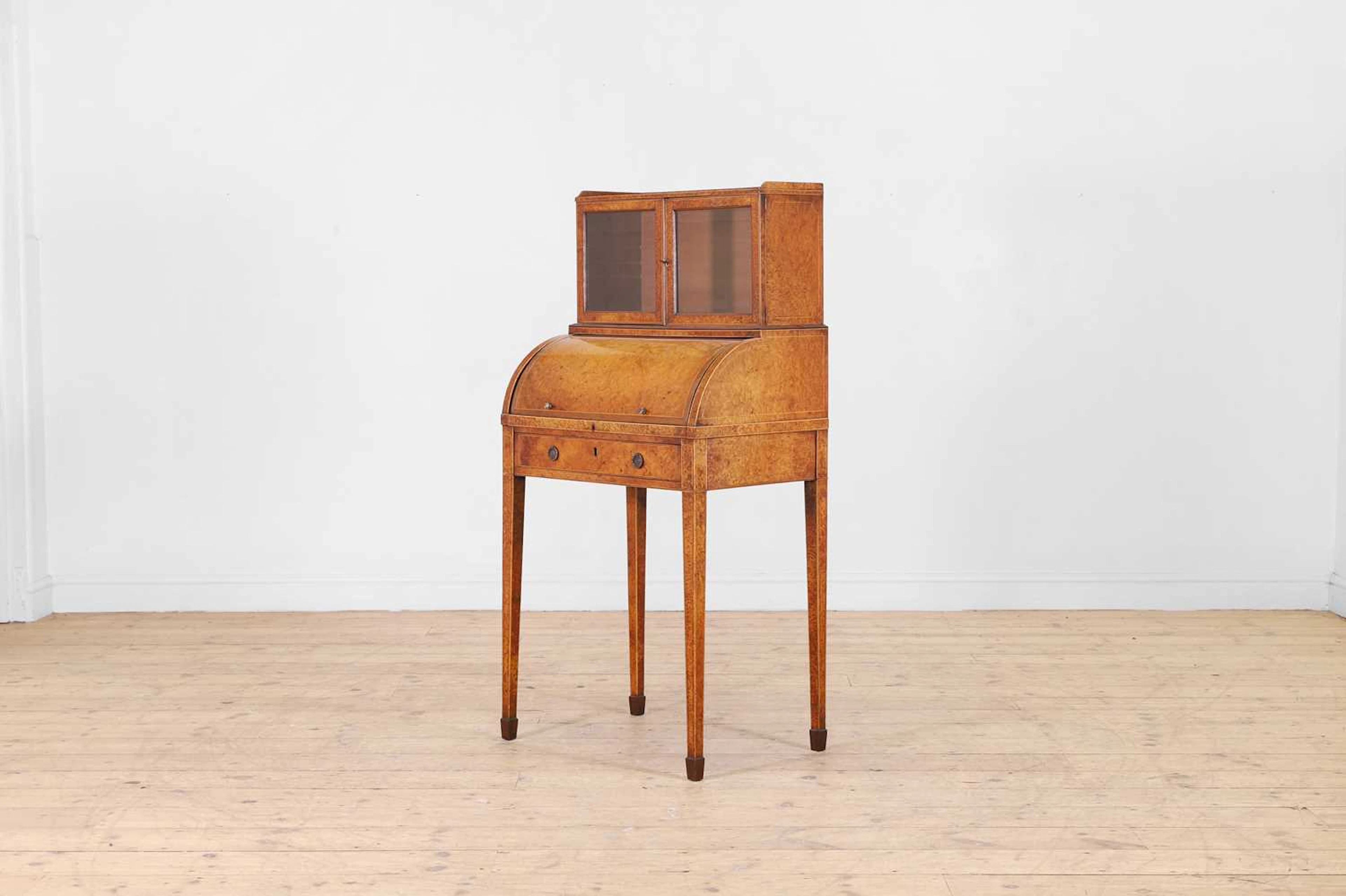 A George III amboyna cylinder writing desk