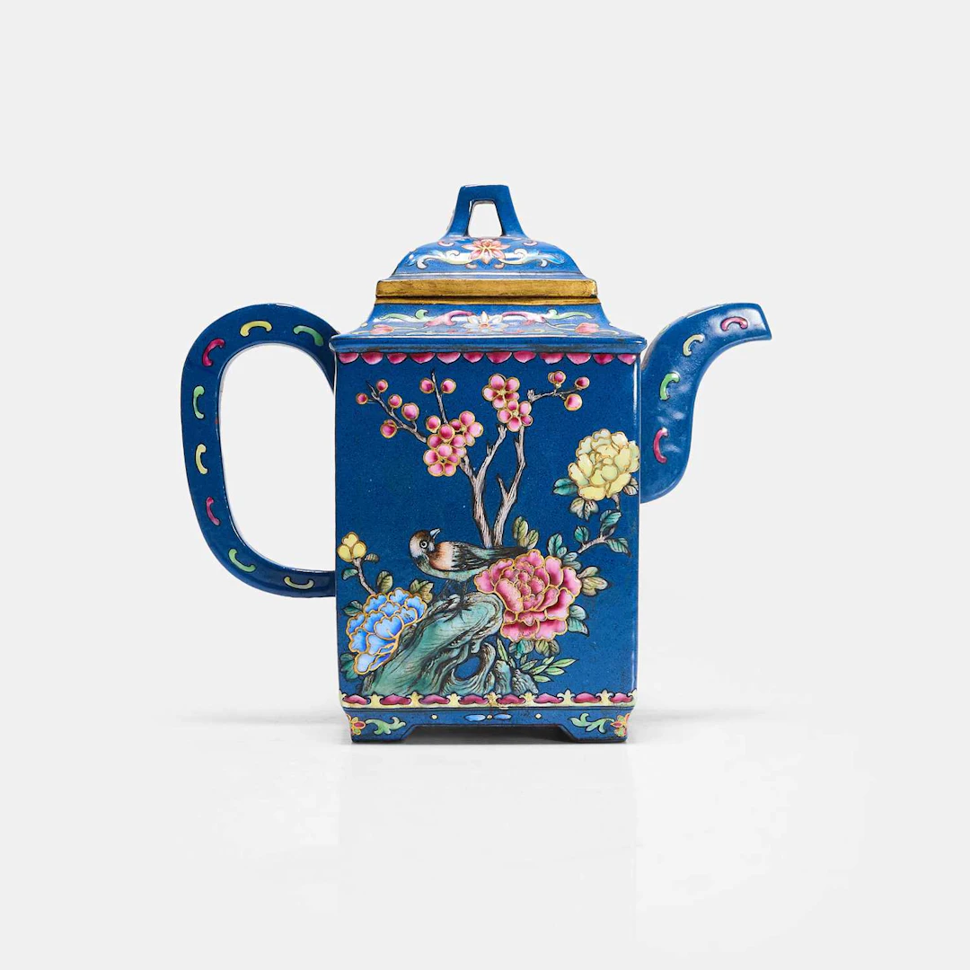 A Chinese famille rose-decorated Yixing teapot and cover