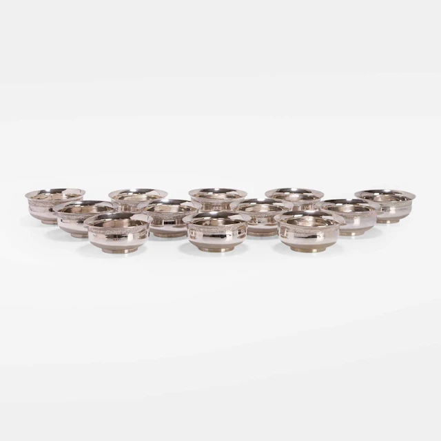 A collection of twelve Persian silver bowls 20th century, Iran