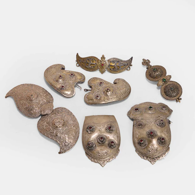 A collection of Ottoman gilt white-metal ceremonial belt buckles late