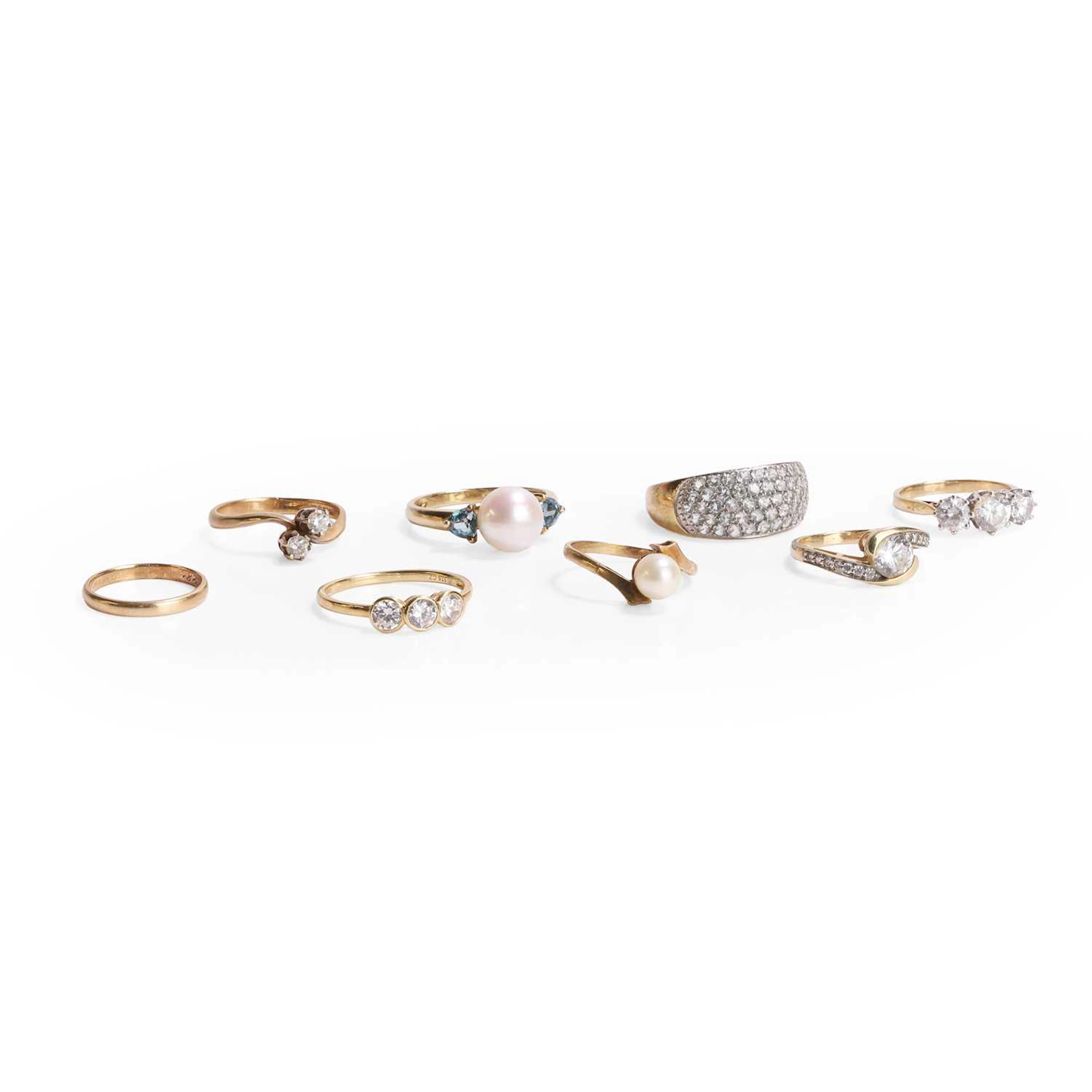 A collection of assorted gold rings