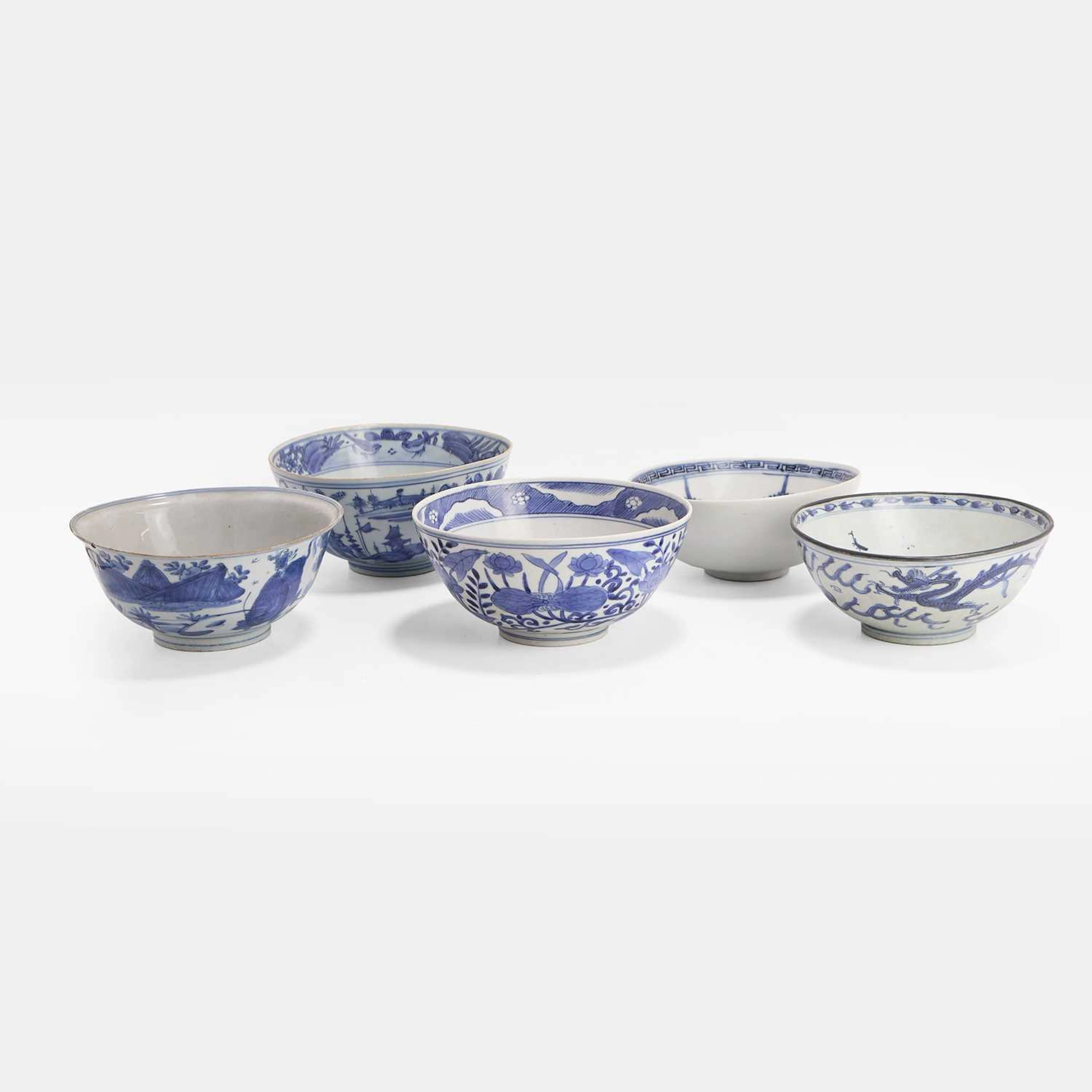 A collection of five large Chinese blue and white bowls late Ming dynasty