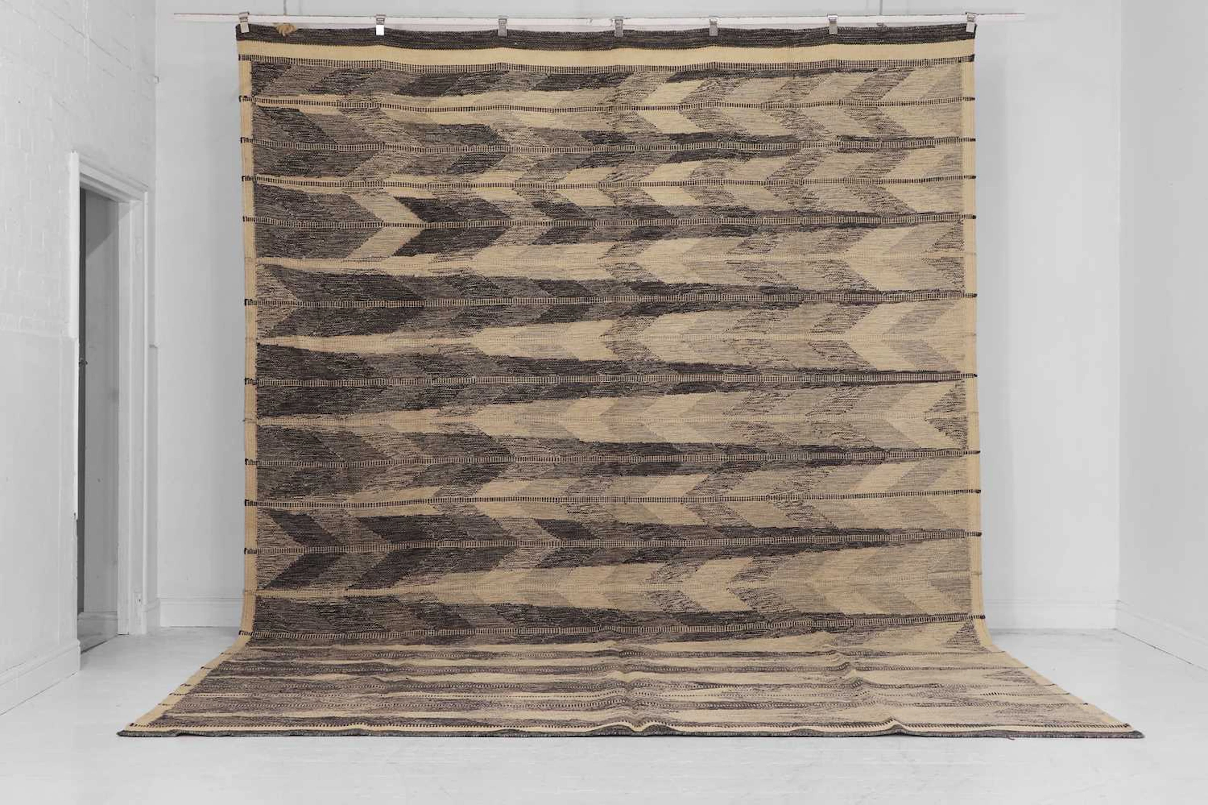 A flat-weave wool carpet of Scandinavian design