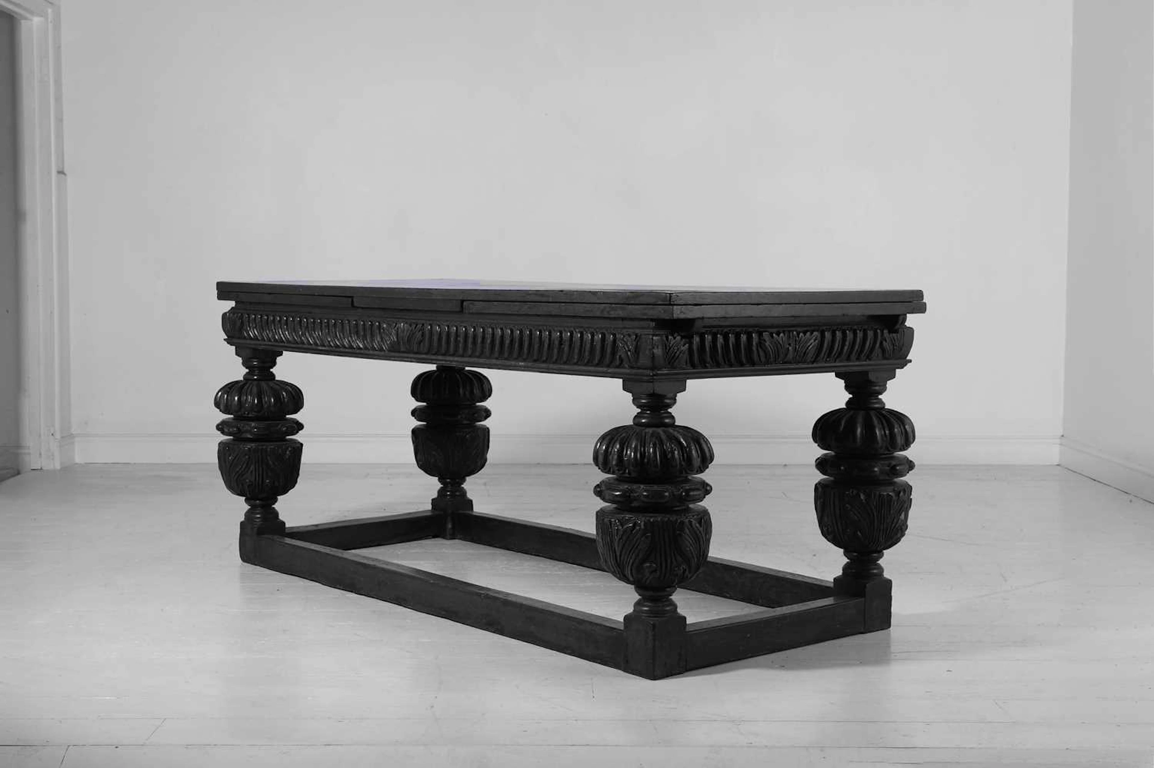An Elizabethan-style oak refectory table