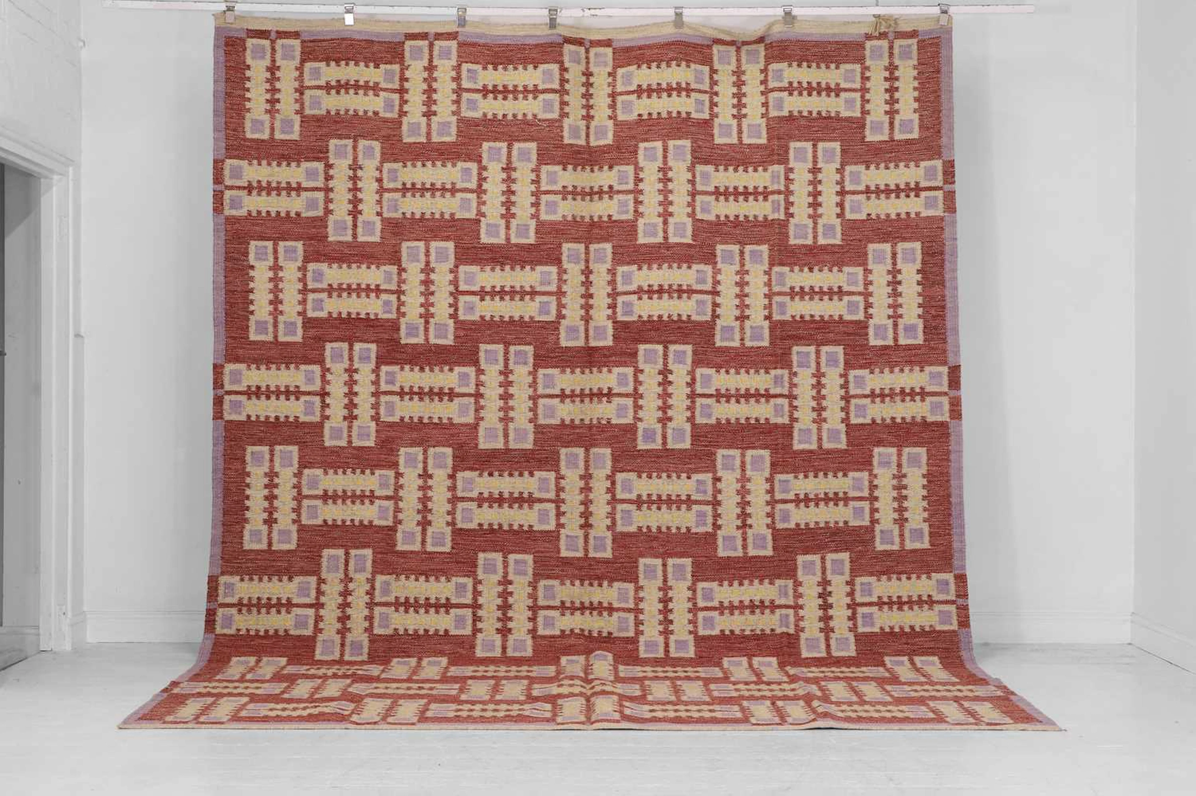 A flat-weave wool carpet of Scandinavian design