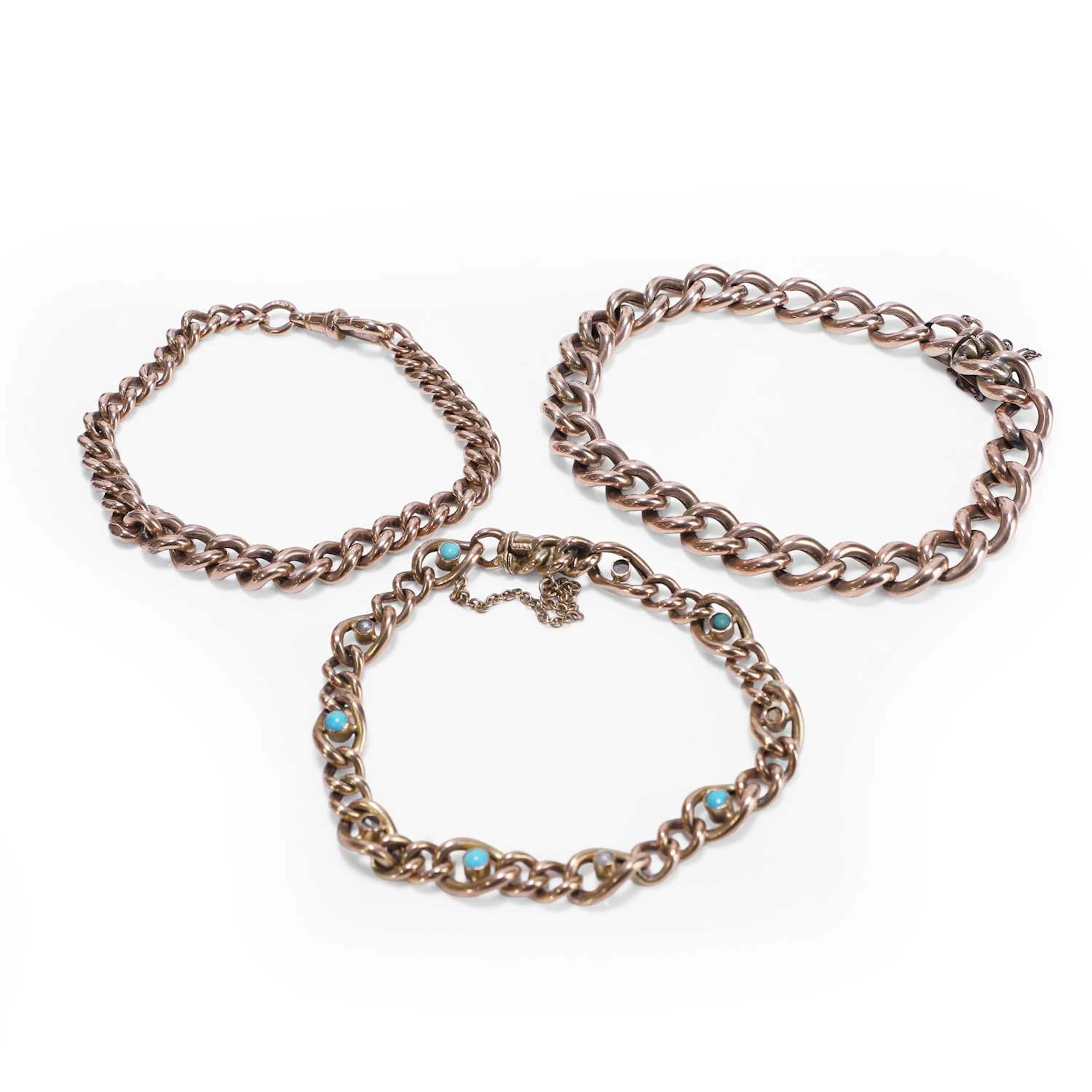 A group of three early 20th century gold link bracelets