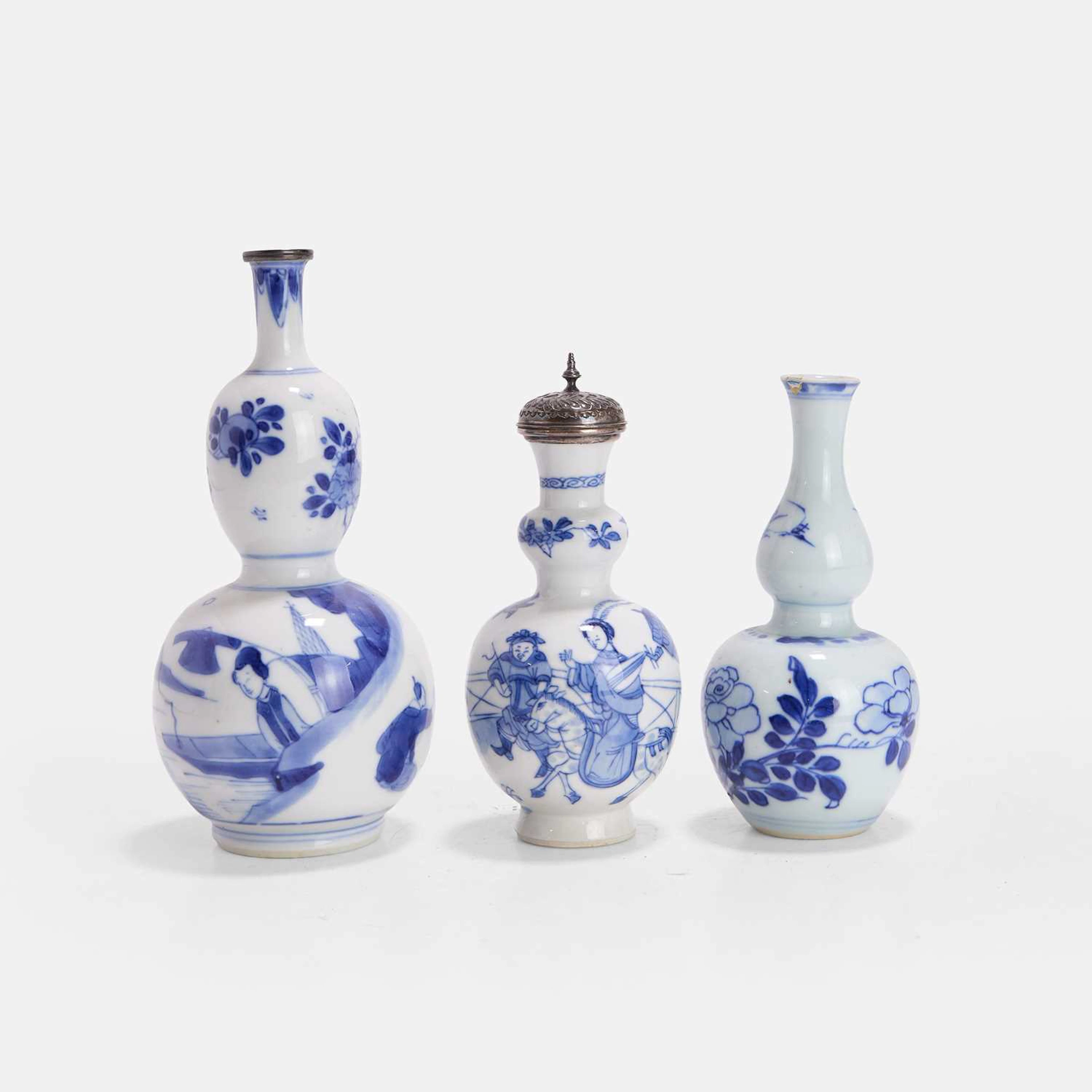 Three Chinese blue and white double-gourd vases Kangxi (1662-1722)