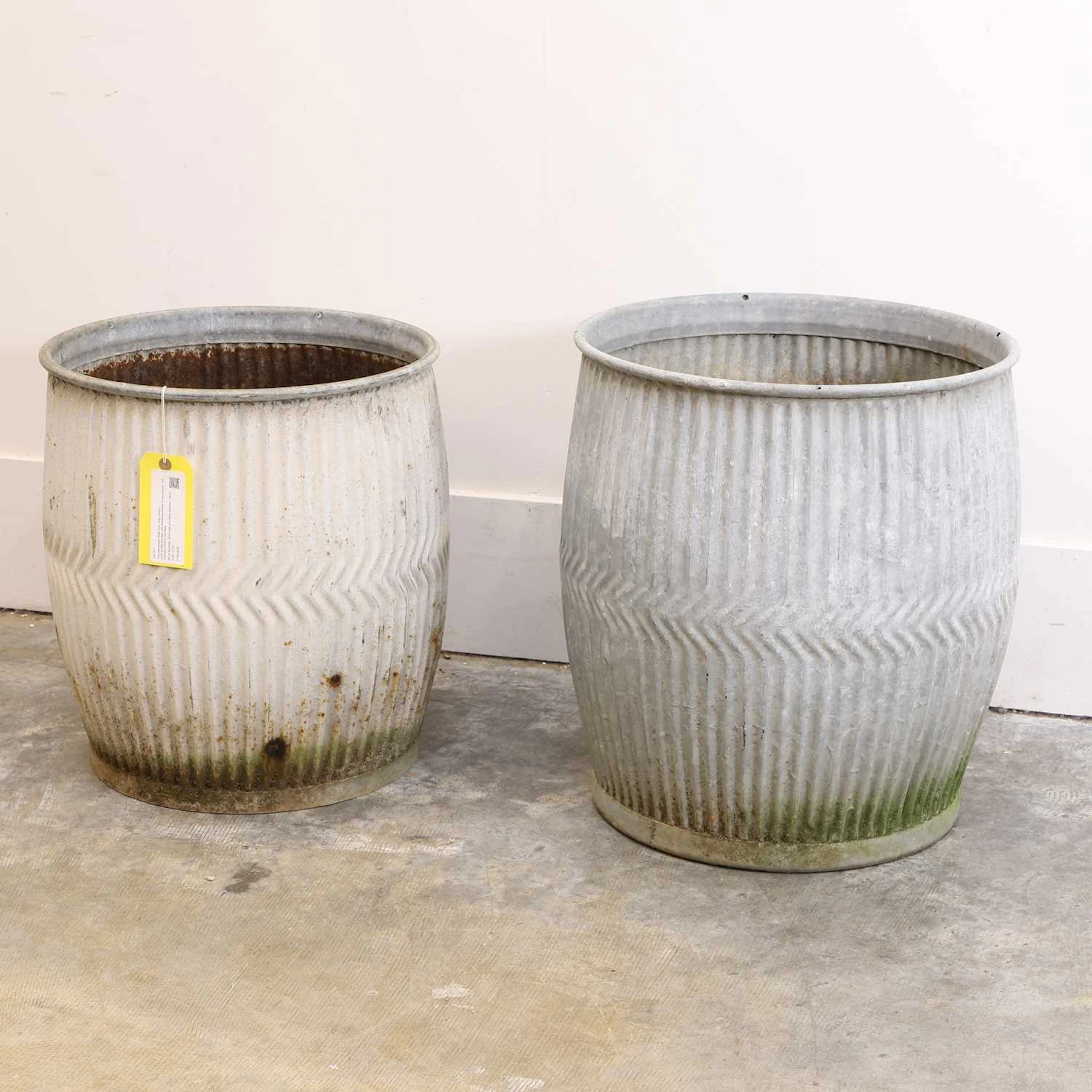 Two galvanised 'Dolly' tubs 20th century