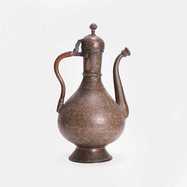 An Indian brass ewer late 19th/early 20th century, Northern India, Kashmir