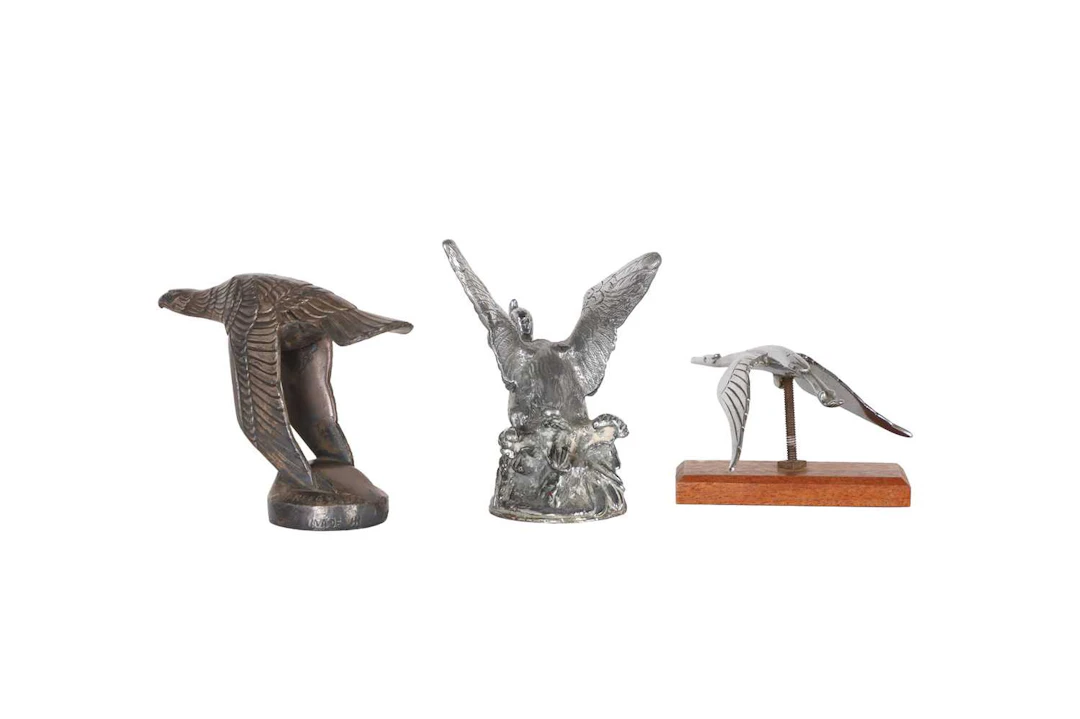 A group of car mascots depicting birds 20th century