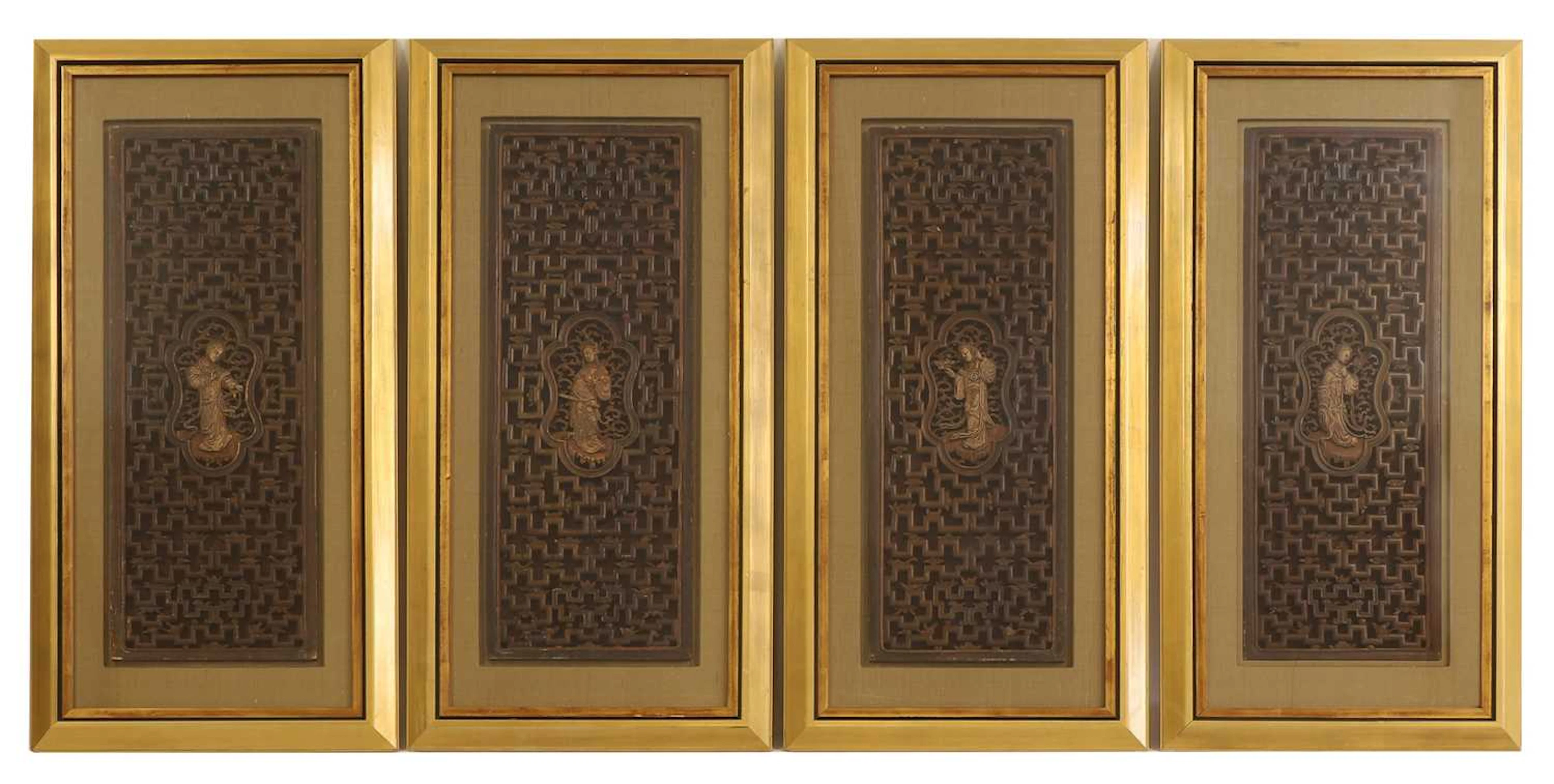 A set of four pierced and lacquered screen panels late Qing dynasty