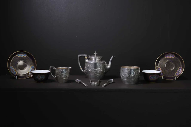 A Victorian silver and Sèvres porcelain tea set