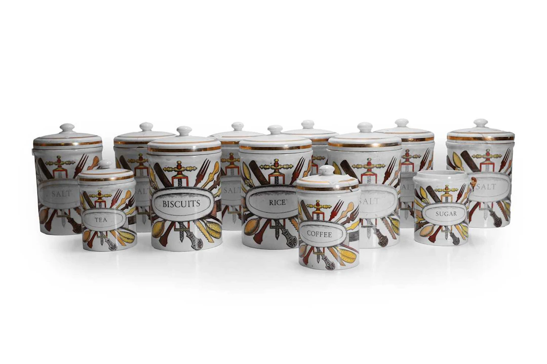 Piero Fornasetti (Italian, 1913-1988) a set of twelve storage jars
