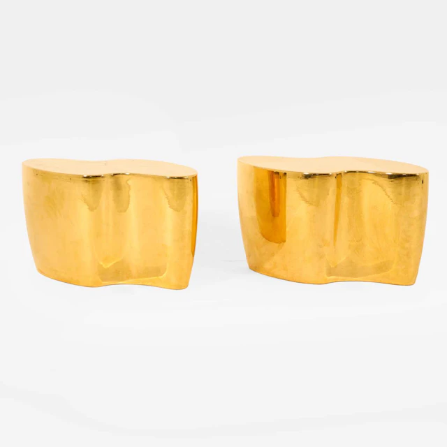 Manner of Karl Springer a pair of side tables