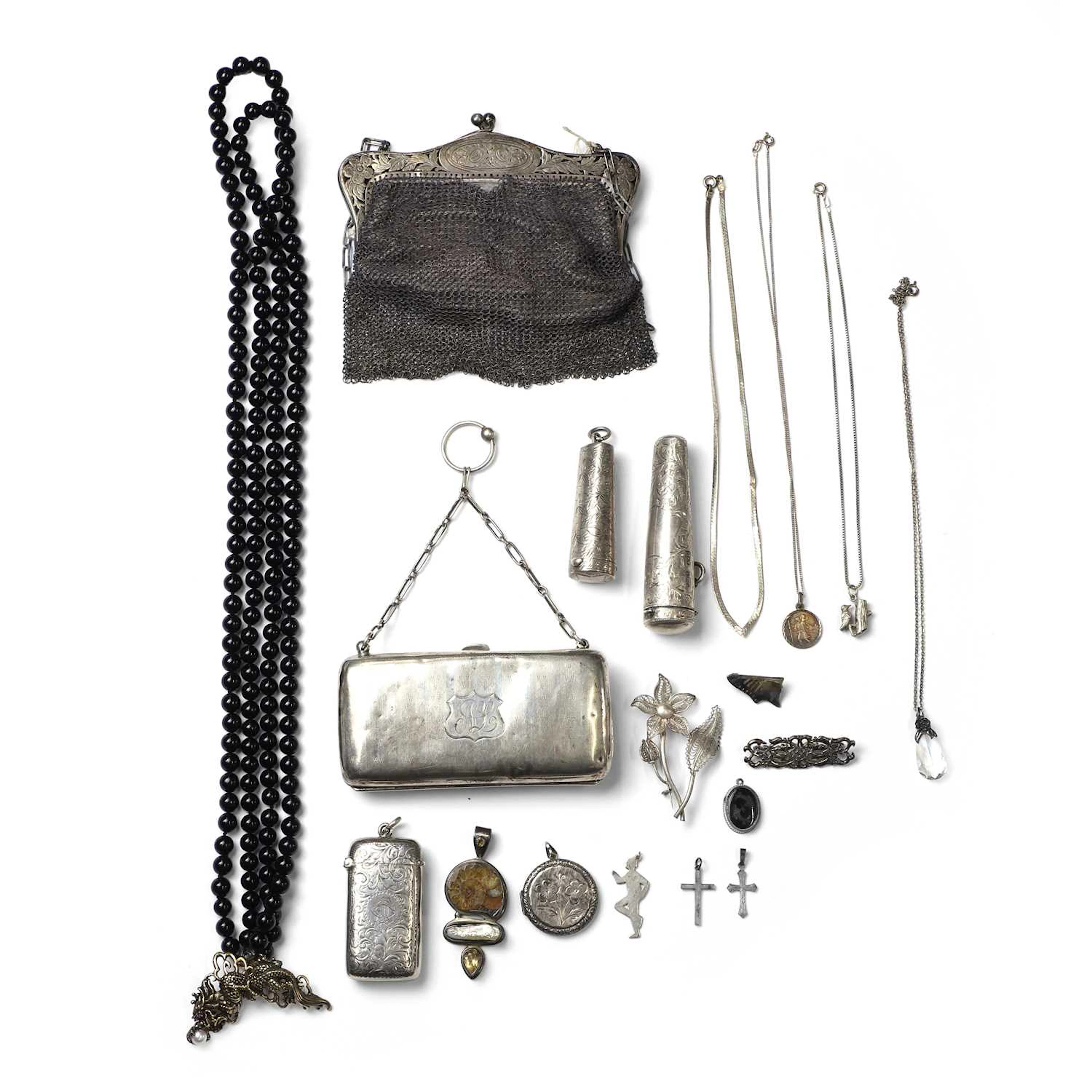 A group of silver jewellery and objects