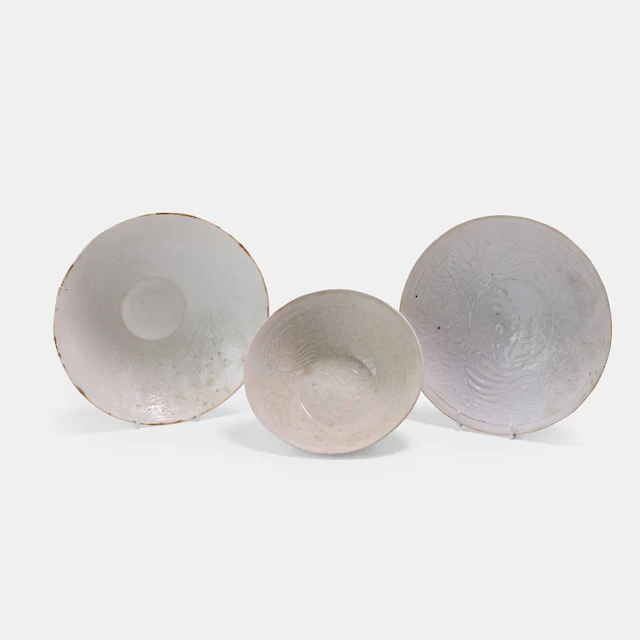 Three Chinese qingbai-glazed bowls Yuan dynasty (1271-1368)