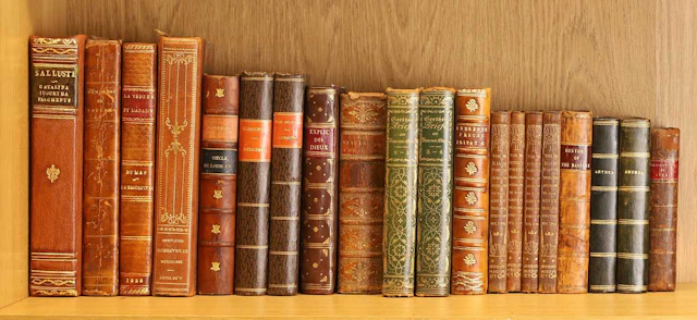 BINDING: A large quantity, including: Erasmus in praise of folly, 1876.