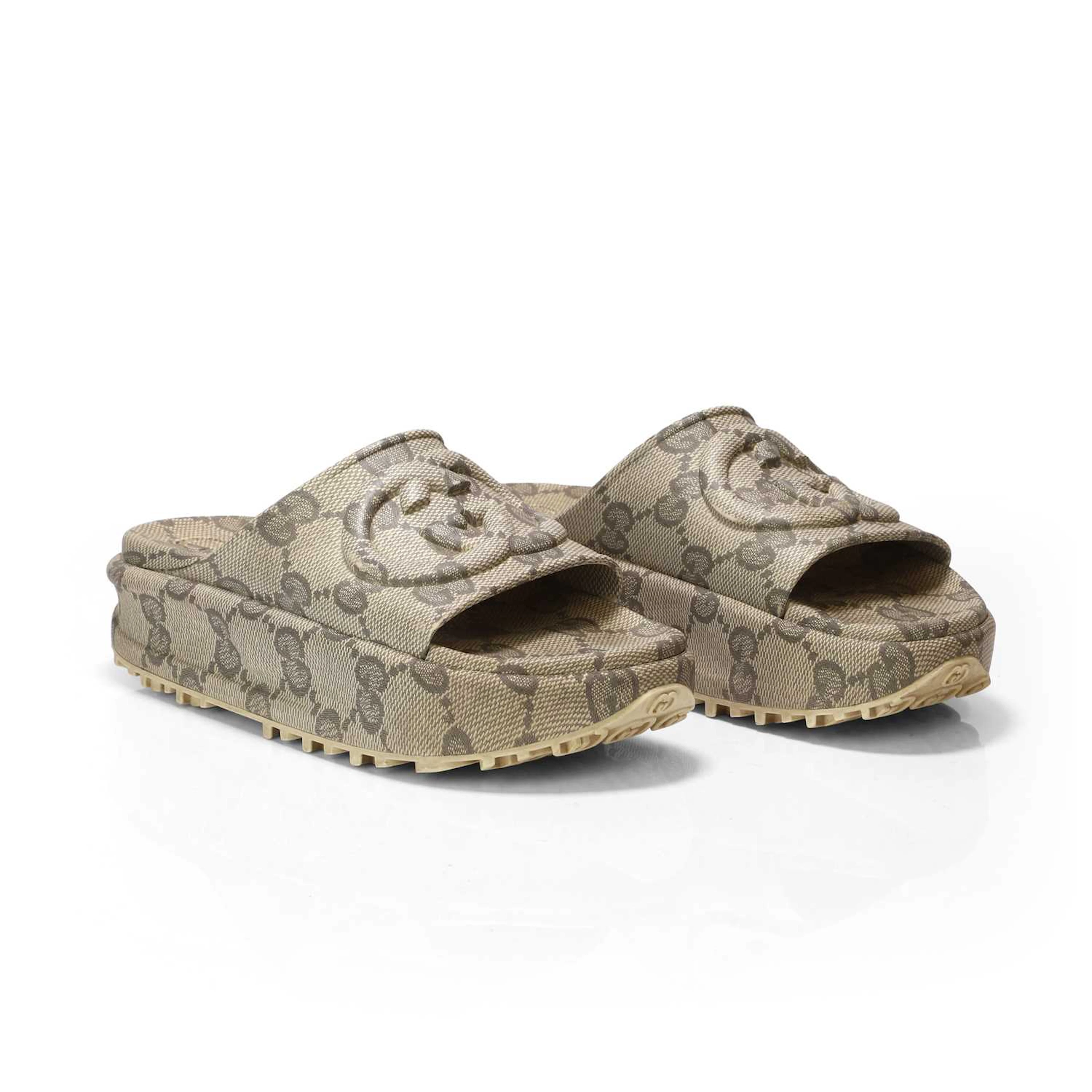 Gucci a pair of sliders