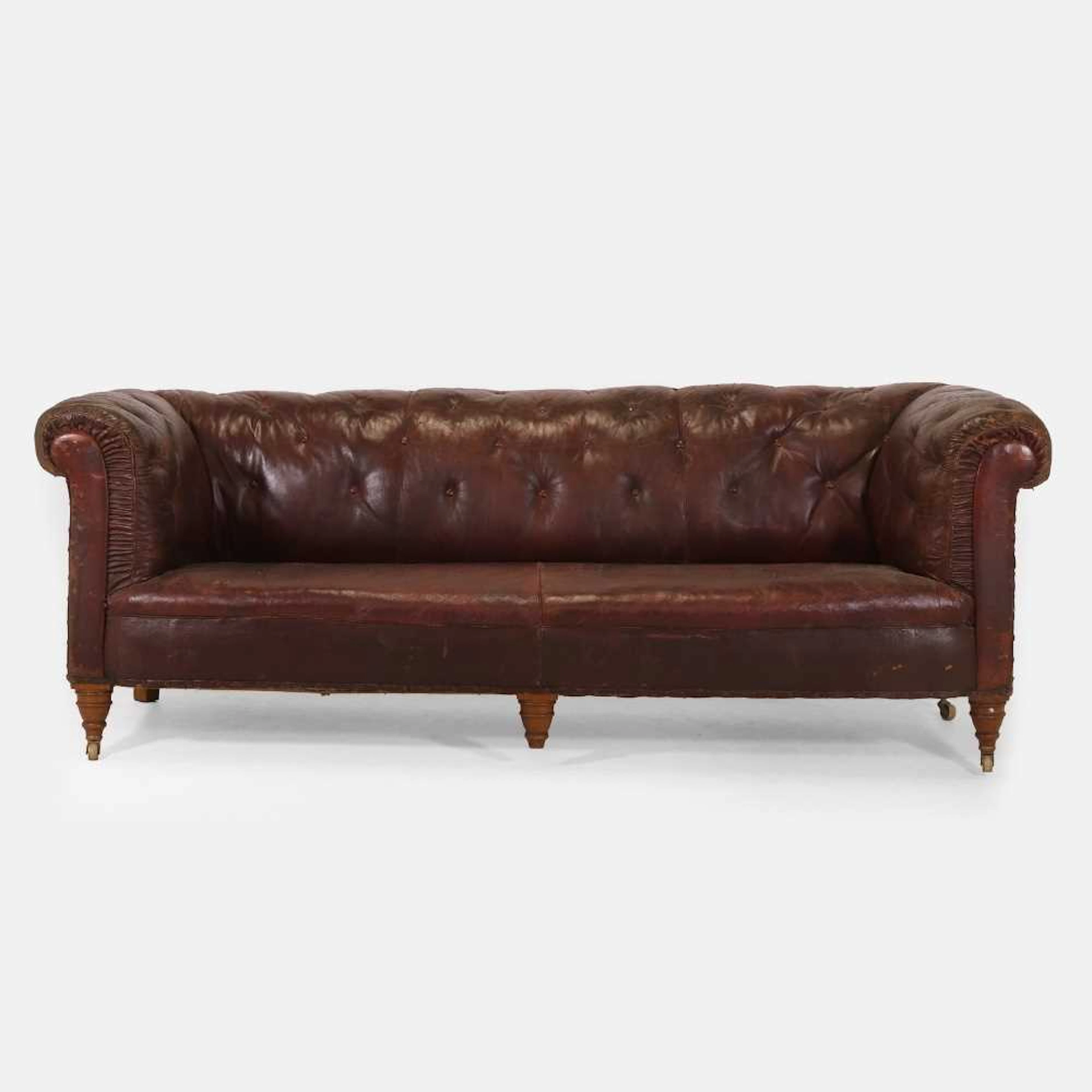 A Victorian buttoned-leather Chesterfield sofa late 19th century