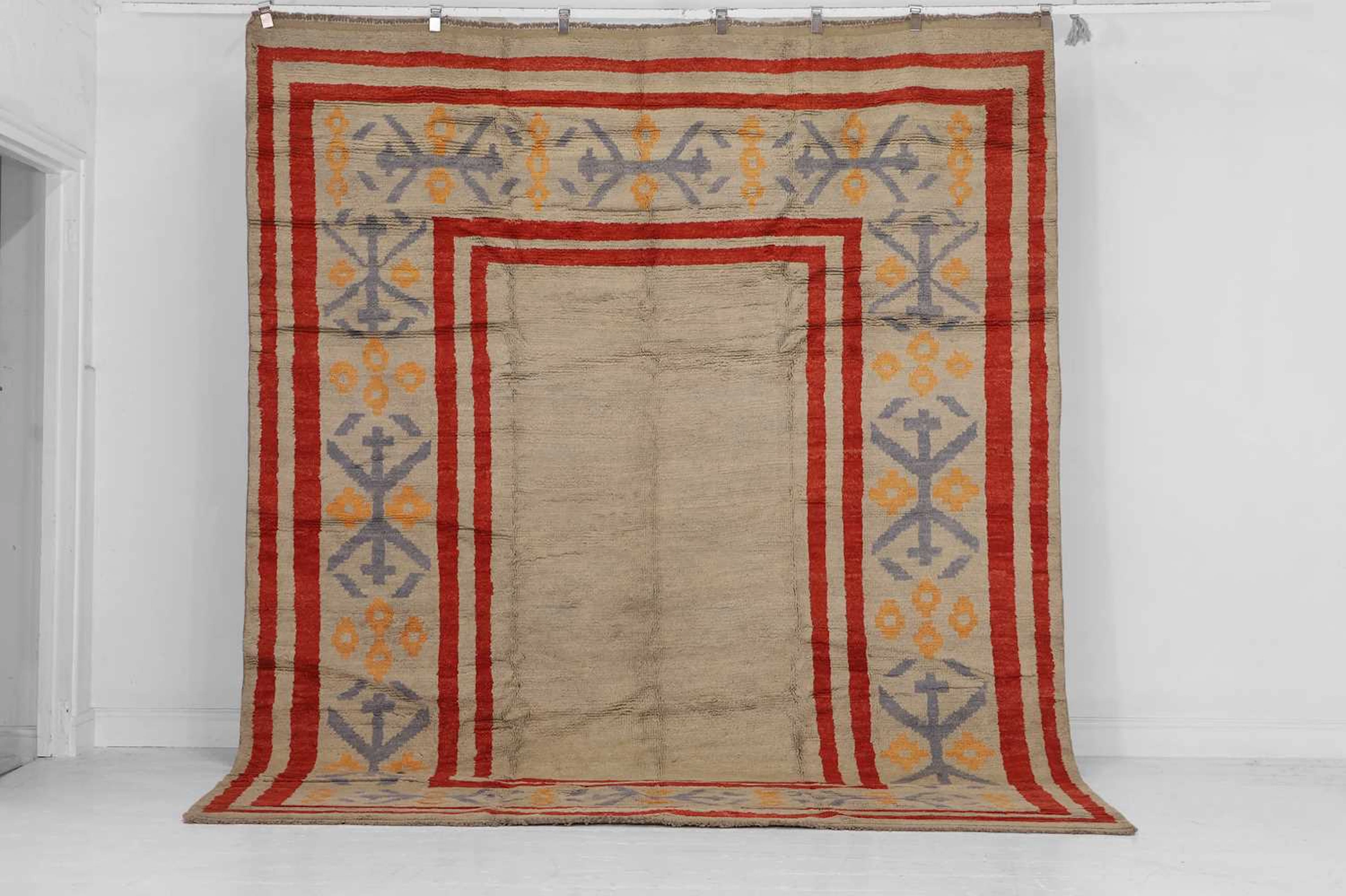 A wool carpet of mid-century Scandinavian design