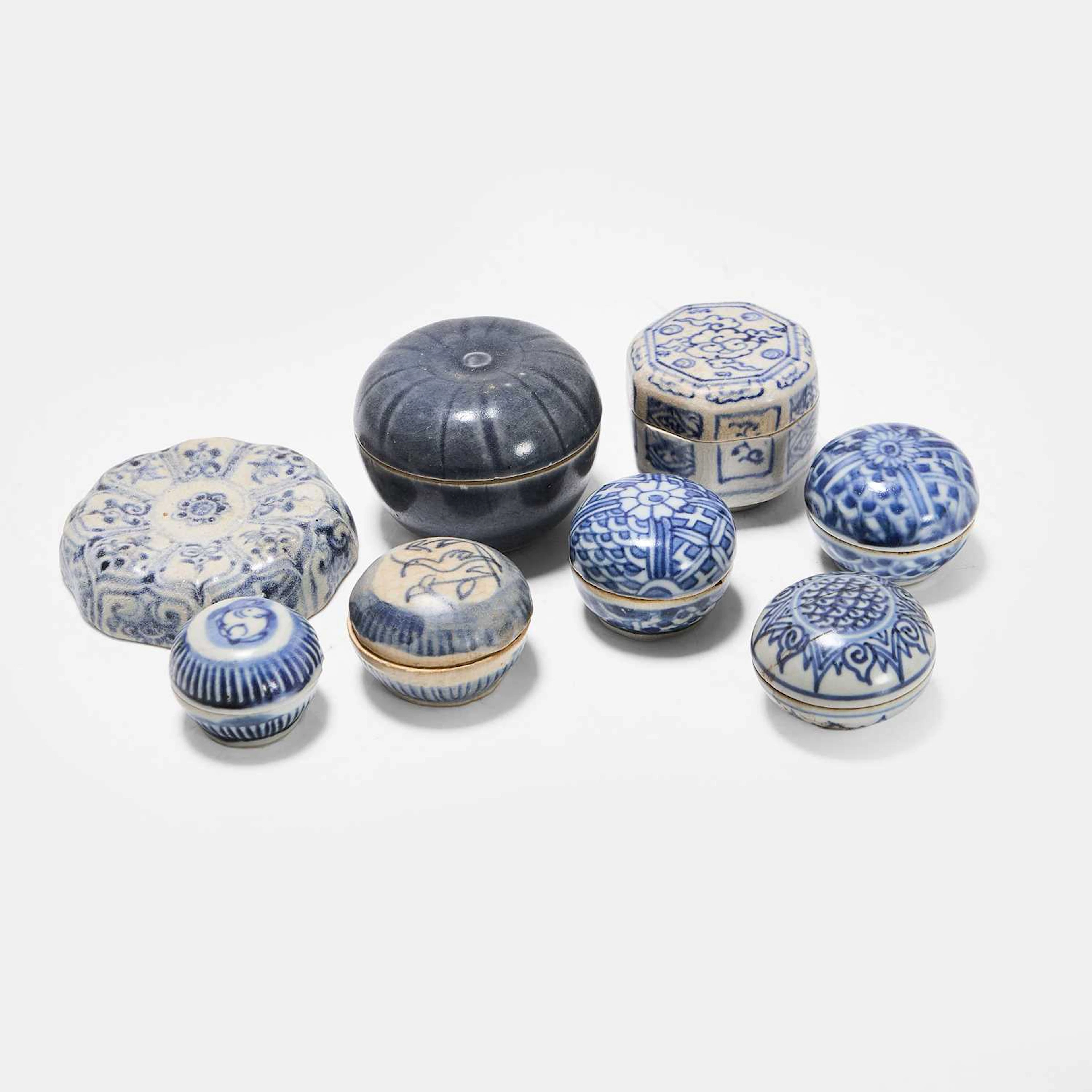 A collection of seven Vietnamese blue and white boxes and covers 15th-16th