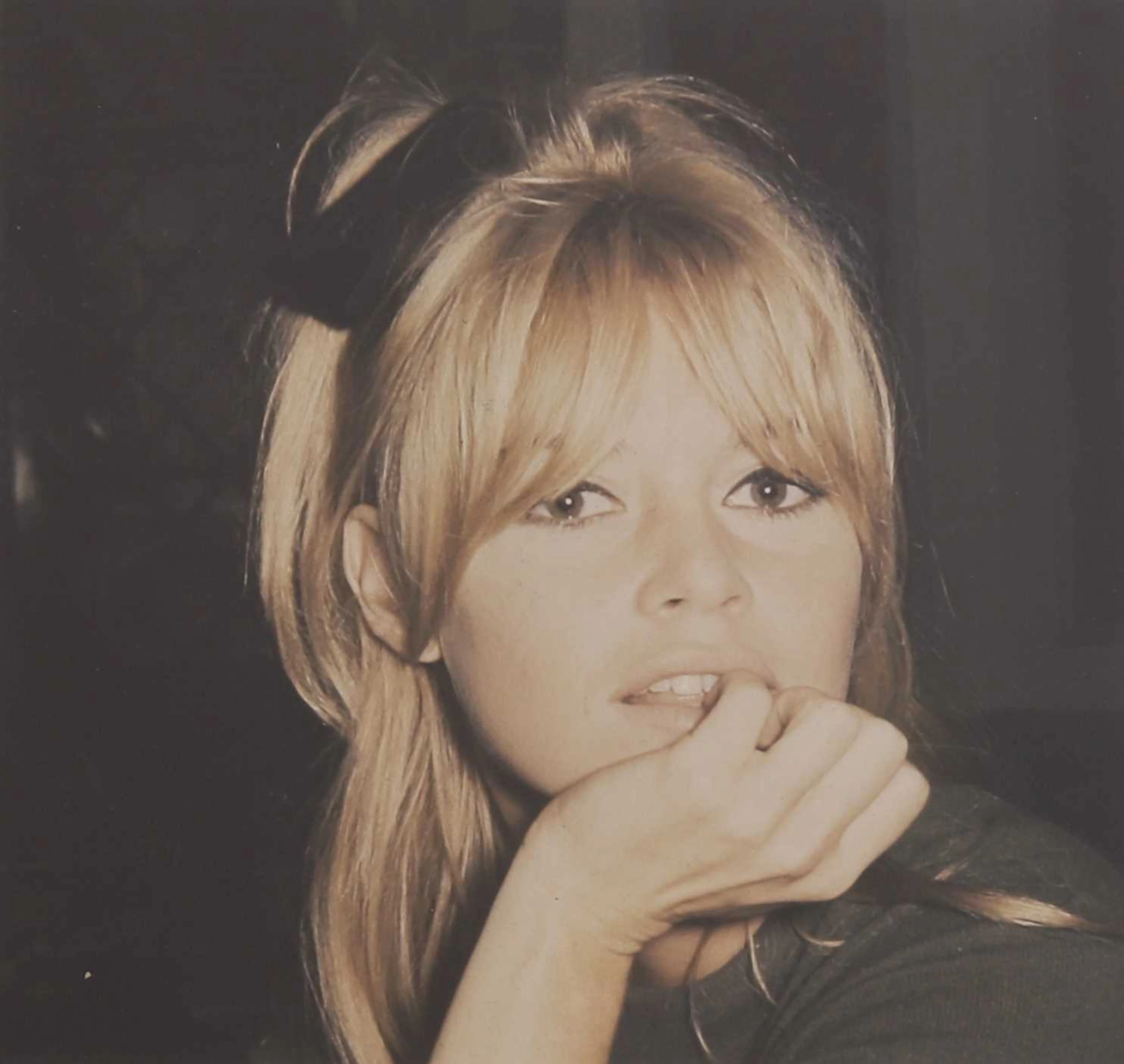 ▲ Ray Bellisario (British, 1936-2018) A colour photograph of Bridget Bardot